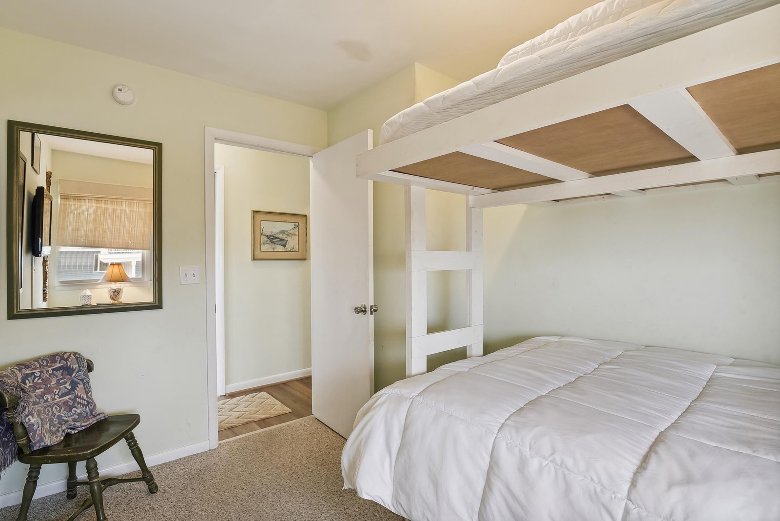 Settle into your cozy bunk bed, where clean linens and a warm, inviting space promise restful nights after your daily adventures.