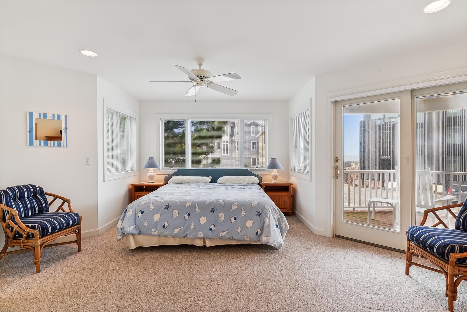 Step into your coastal retreat where bright windows invite natural light and a private balcony awaits your morning coffee with ocean breezes.