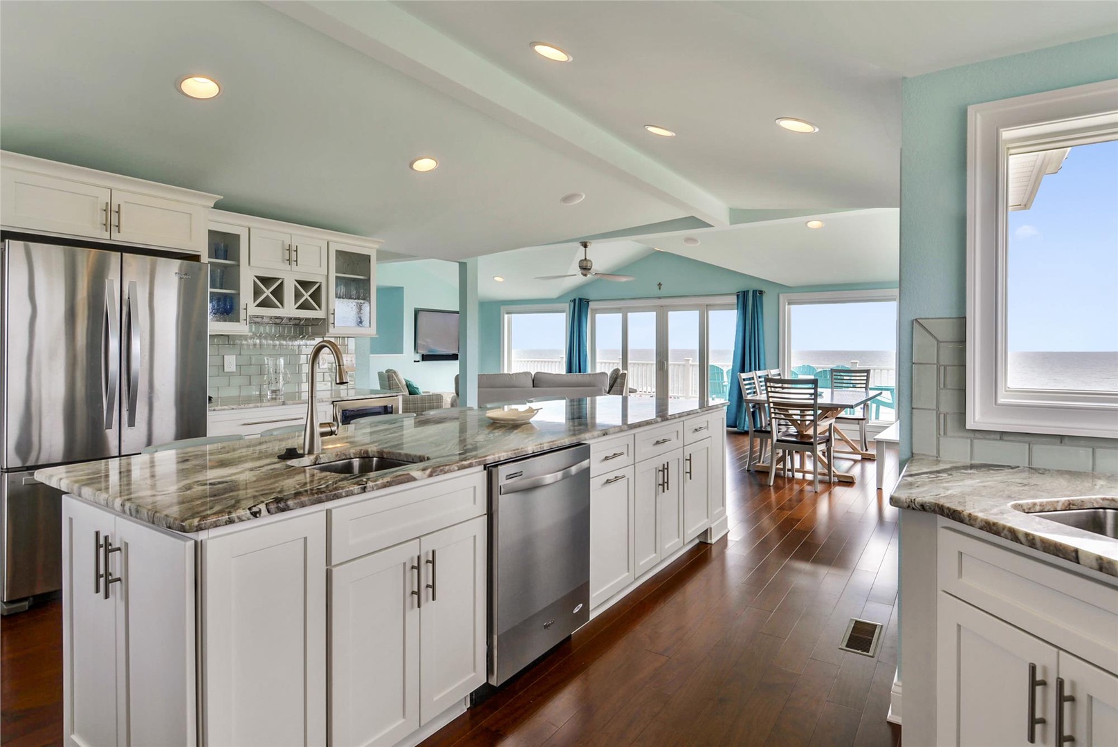 Imagine preparing meals in your gourmet kitchen with granite countertops, stainless appliances, and stunning ocean views framing every moment of your coastal getaway.
