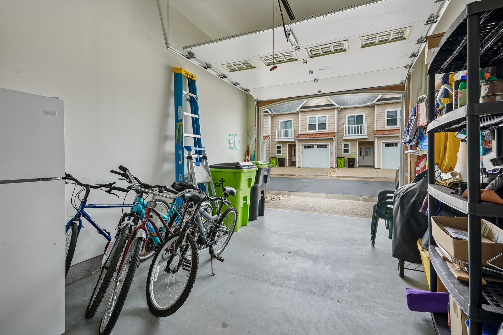 Your private garage offers secure bike storage and plenty of space for gear, connecting directly to charming neighborhood streets.
