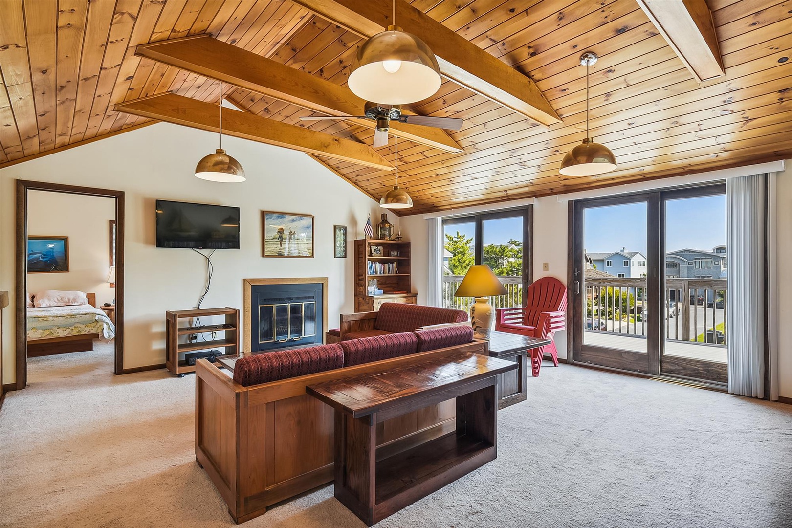 Relax under soaring wood-beamed ceilings as you watch the ceiling fan spin. Step onto your private balcony and breathe in the ocean air from your cozy living space.