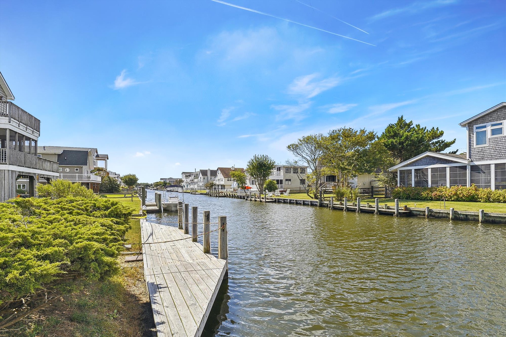 Waterfront property located in a peaceful canal community with private docks and scenic water views, offering direct access to boating and coastal recreation.