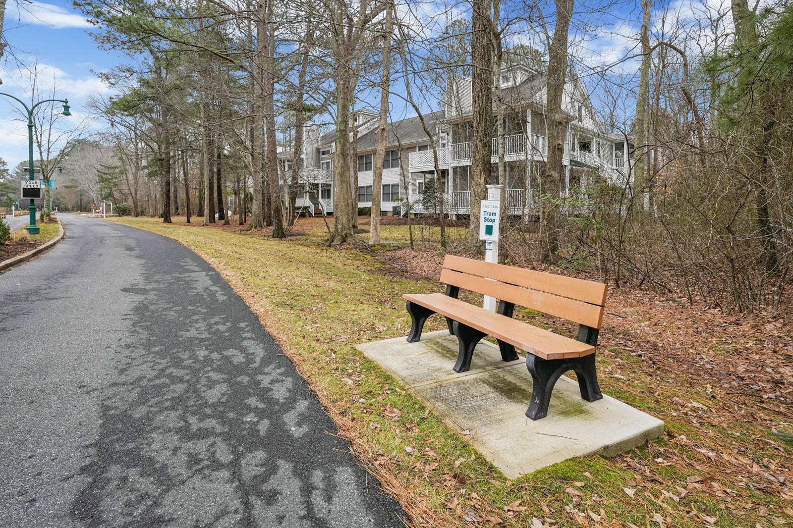 A peaceful wooded neighborhood with paved walking paths and shaded seating areas creates the serene surroundings for your stay.