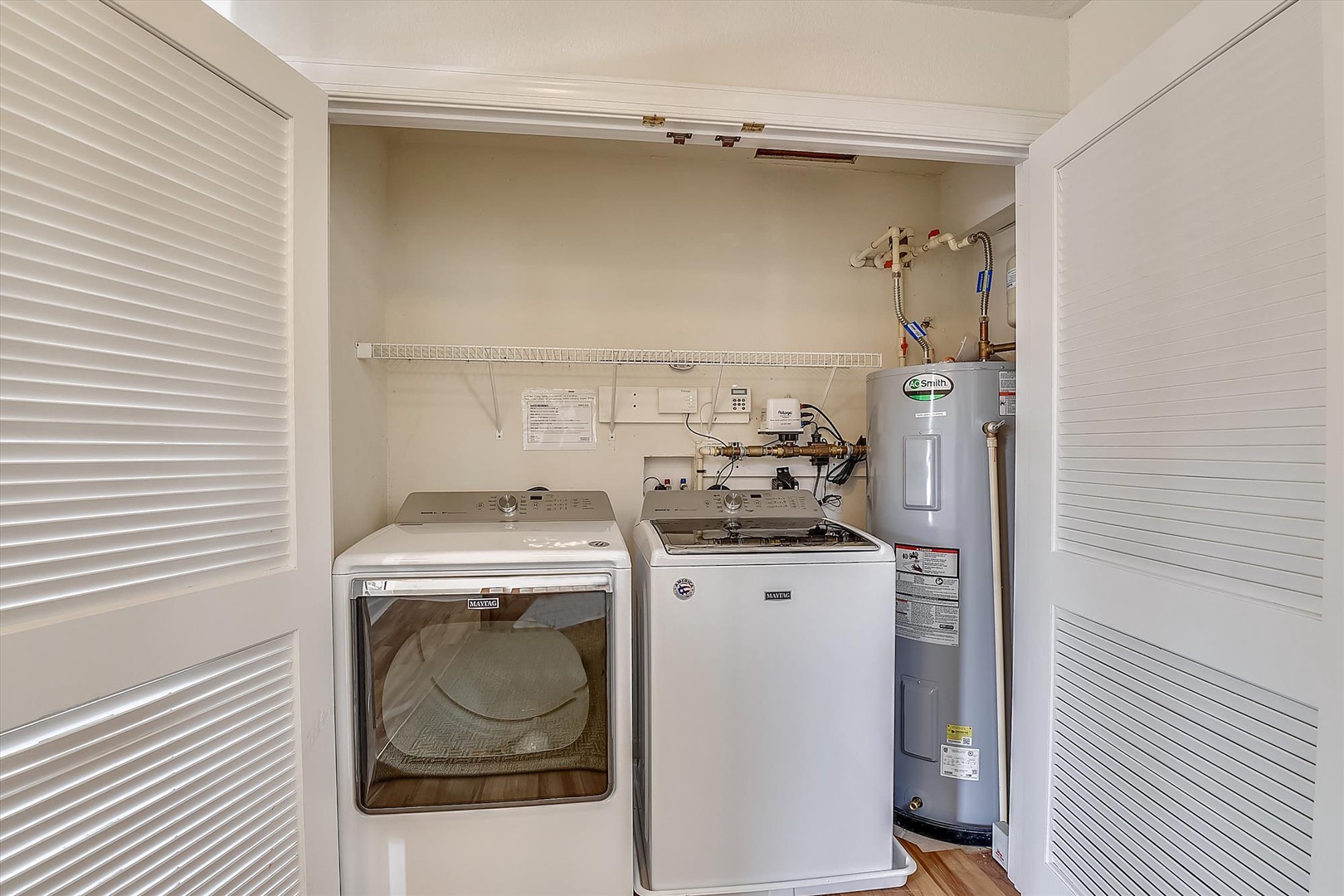 Your personal laundry closet keeps your vacation wardrobe fresh with a full-size washer and dryer tucked behind sleek louvered doors.