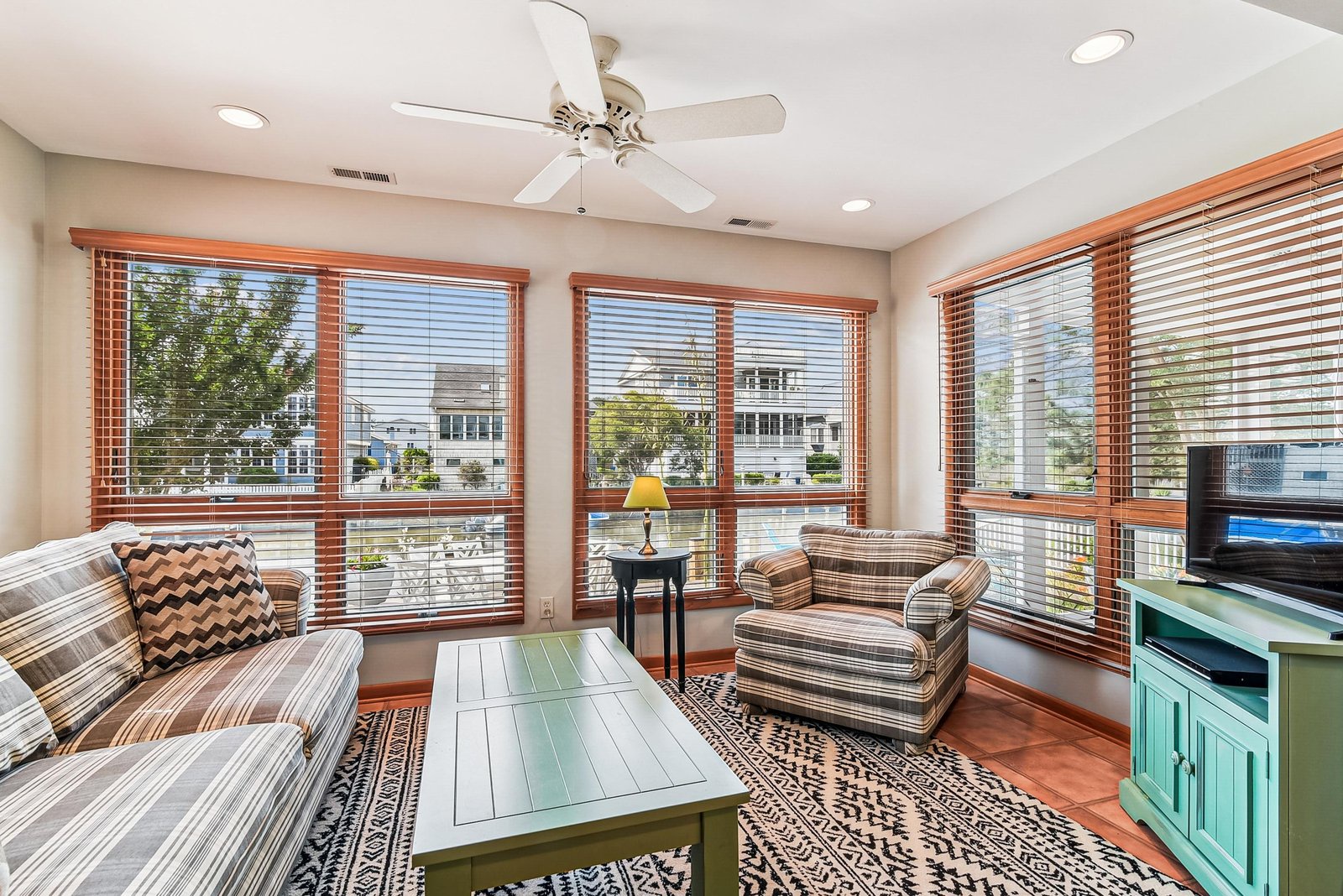 Relax in your bright, inviting living space with comfortable seating and charming coastal-style furnishings that make you feel right at home.