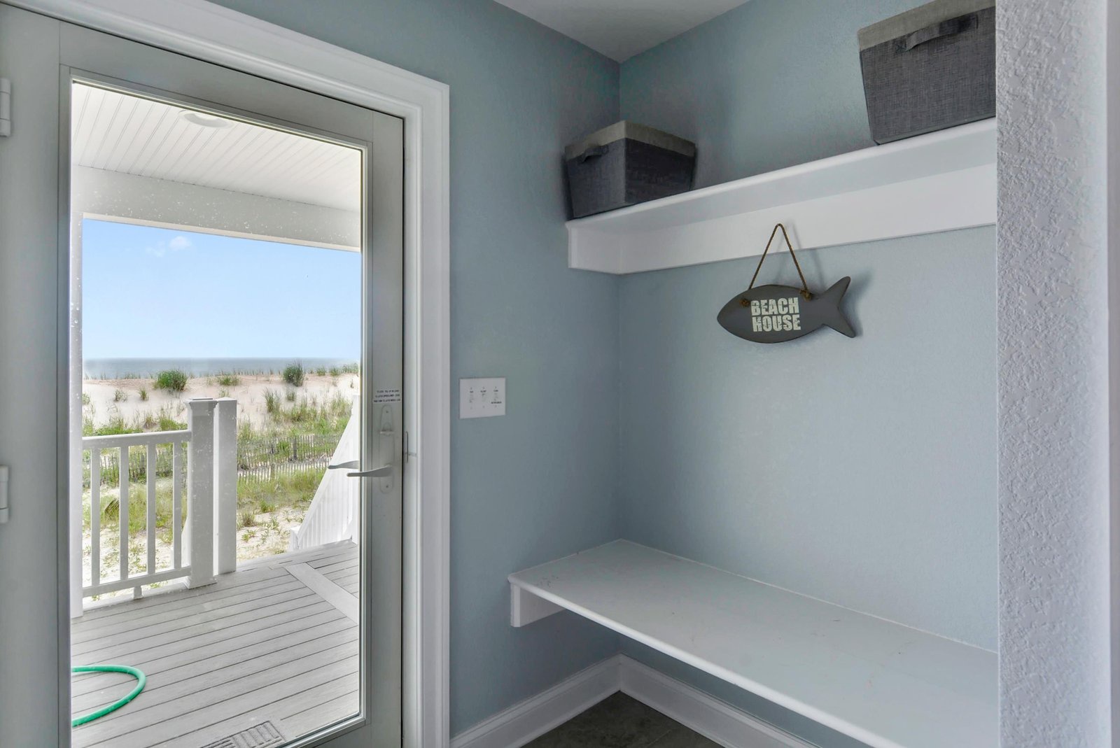 Your personal gear station with beach access—step through the door and you're moments from the sand and surf.