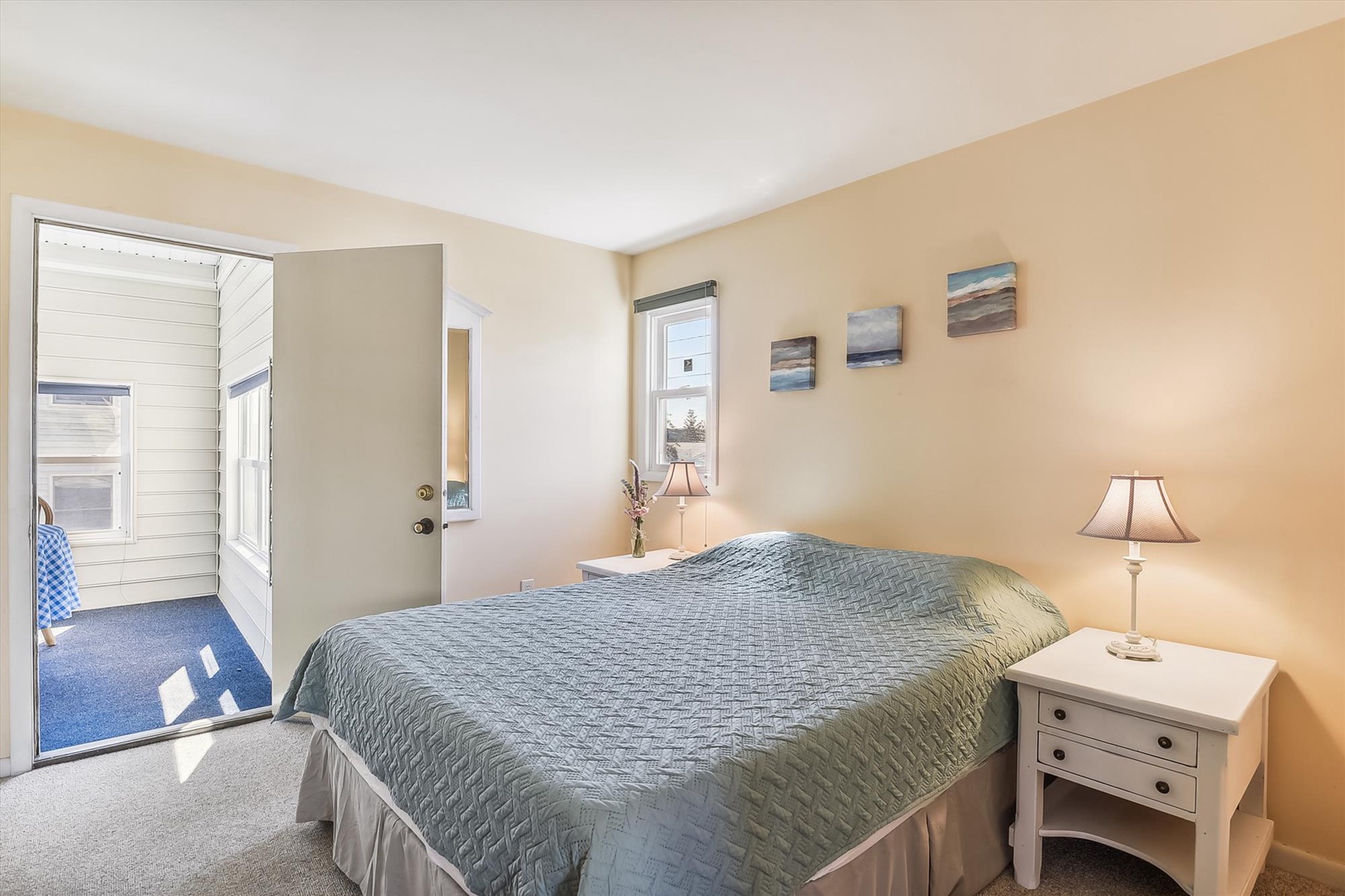 Unwind in this serene bedroom, where soft coastal tones and natural light create your personal retreat. The plush bed invites restful nights, while gentle artwork adds a calming touch to your stay.
