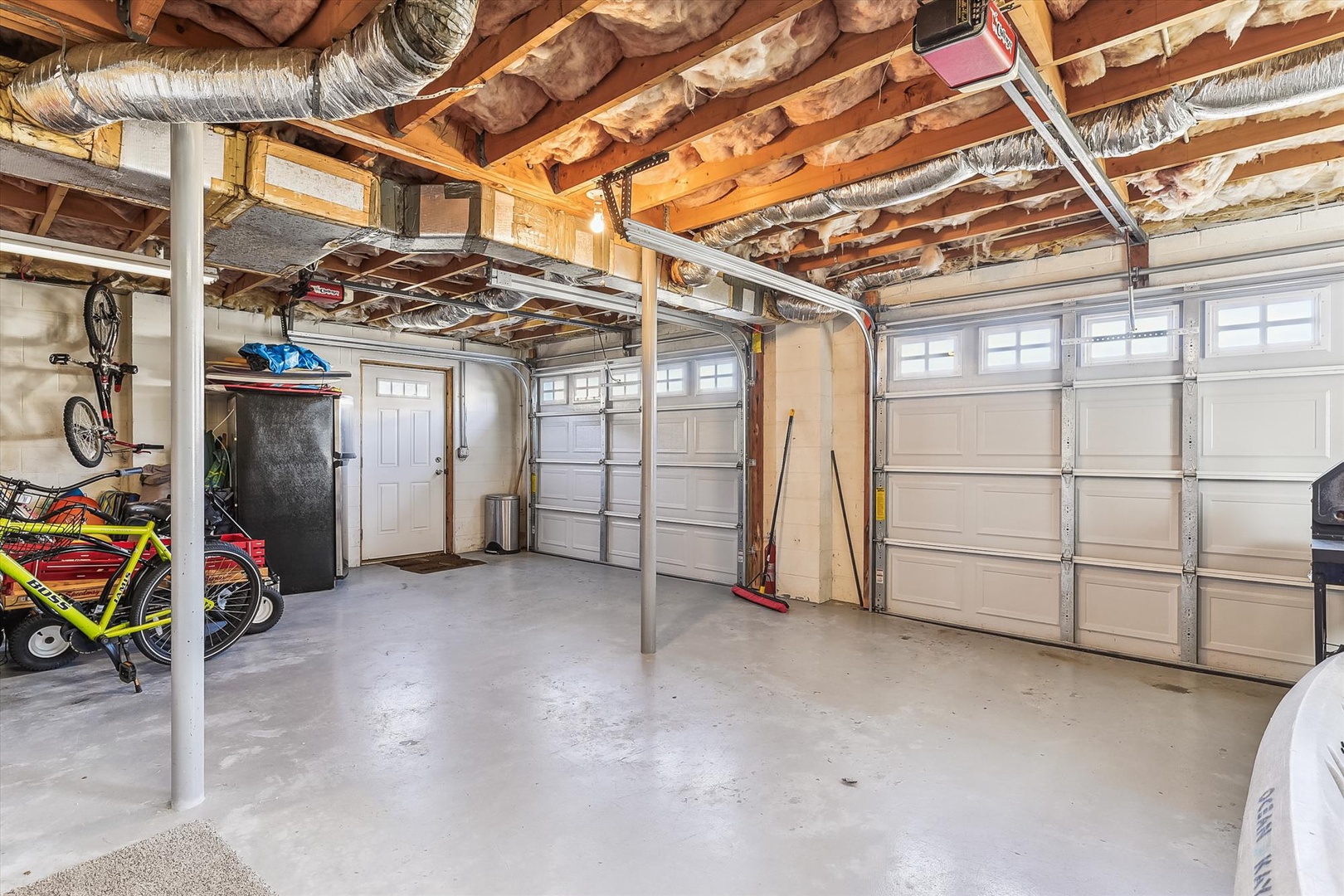 Spacious attached garage featuring plenty of storage, bike racks, and dual door access for your gear and vehicles.