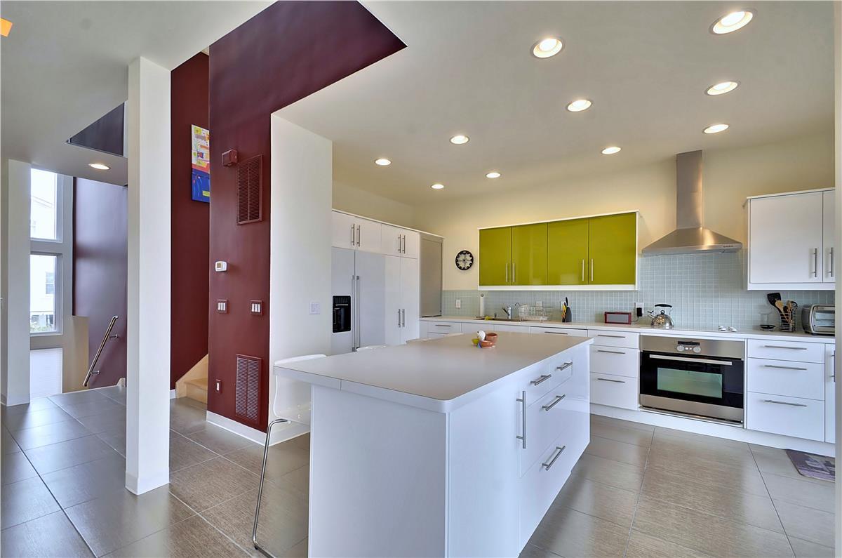 Modern full kitchen with ample counter space, sleek cabinetry, and quality appliances ready for your culinary adventures.