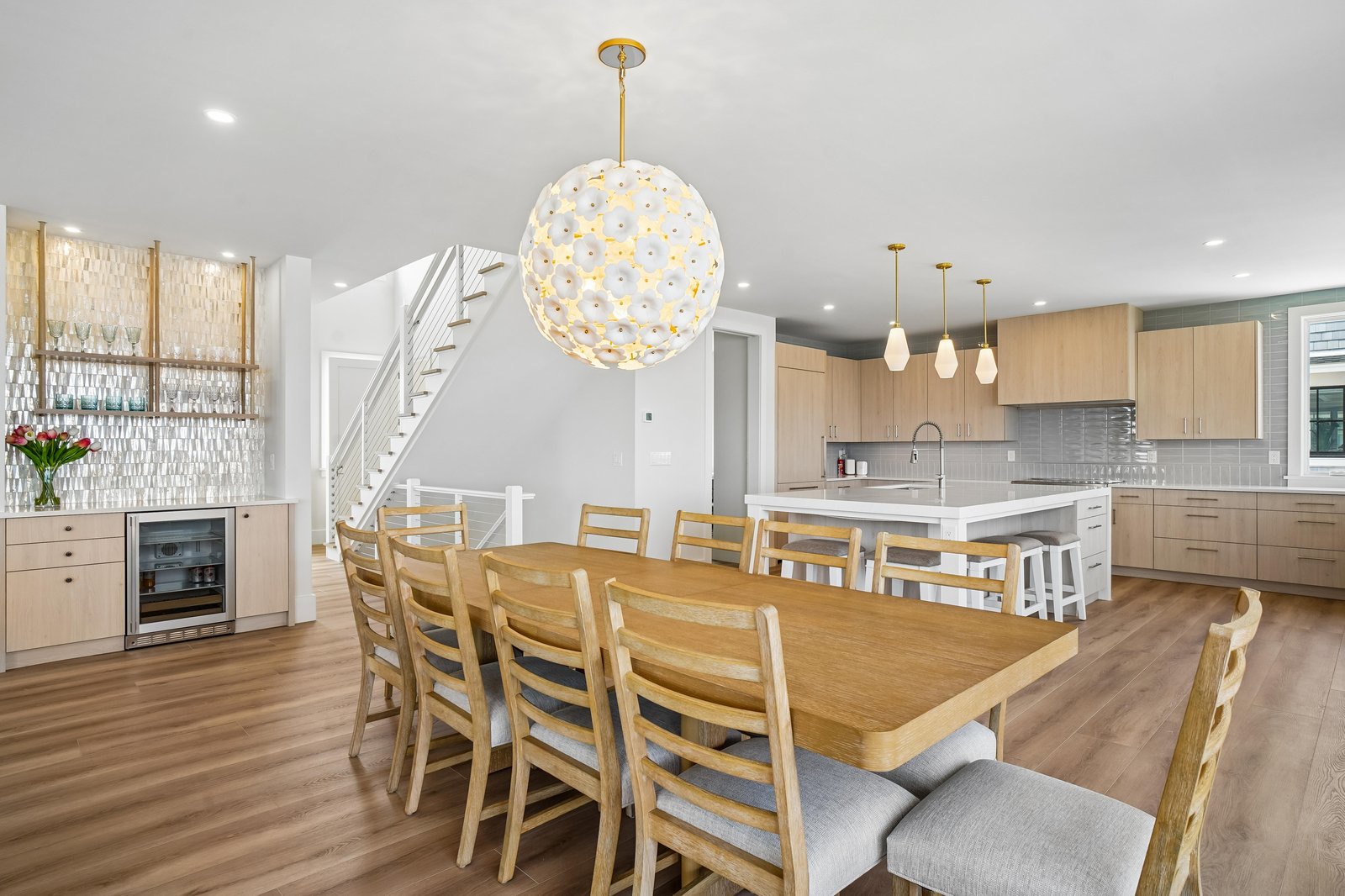 Your spacious dining area flows seamlessly into a bright, modern kitchen—perfect for sharing meals and making memories with everyone you love at one beautiful table.
