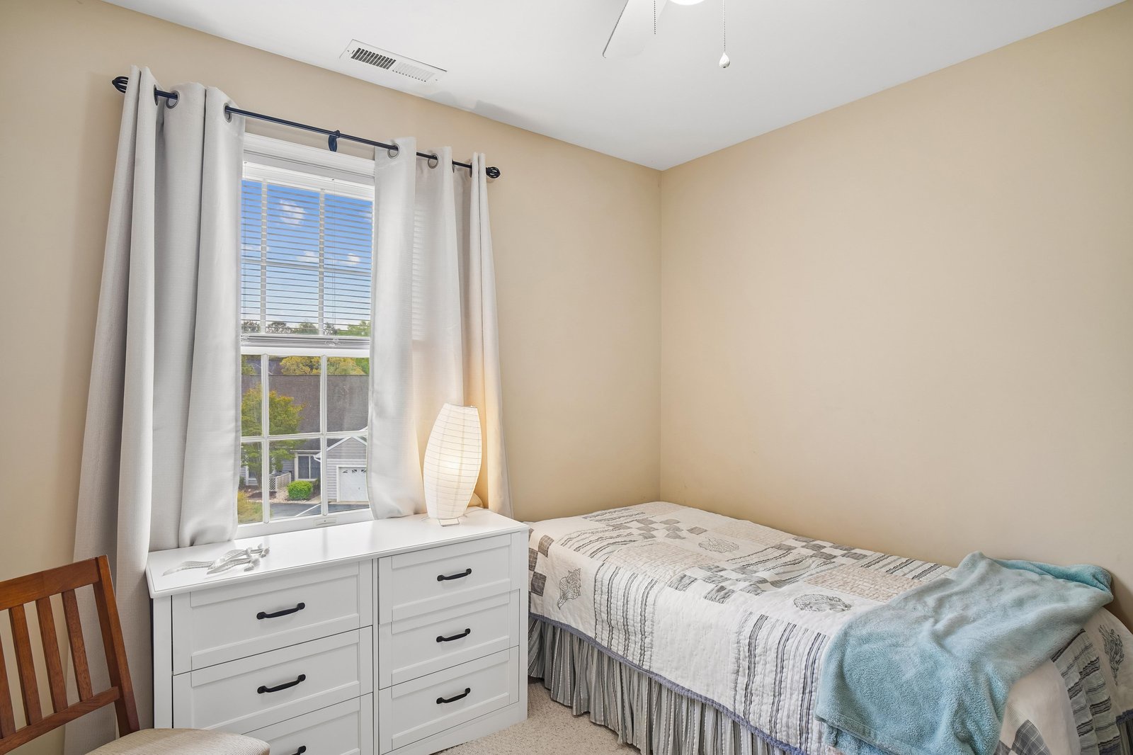 Your cozy bedroom awaits with soft natural light, crisp linens, and plenty of storage space—perfect for unwinding after a day of adventure.