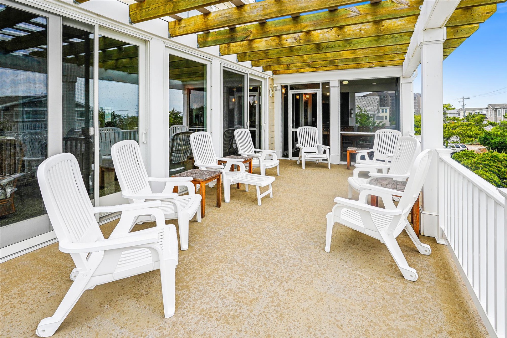 Relax in your own private outdoor space with plenty of seating for soaking up the sun or enjoying an evening breeze under the pergola.