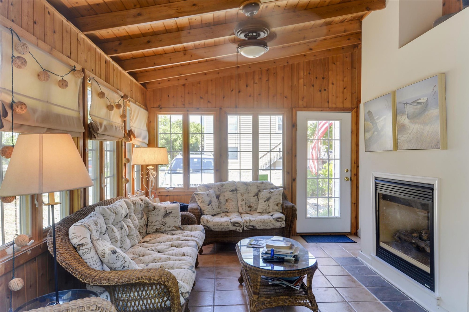 Sink into plush wicker seating warmed by your private fireplace, where natural wood and soft lighting create the perfect spot to unwind after a day of adventures.