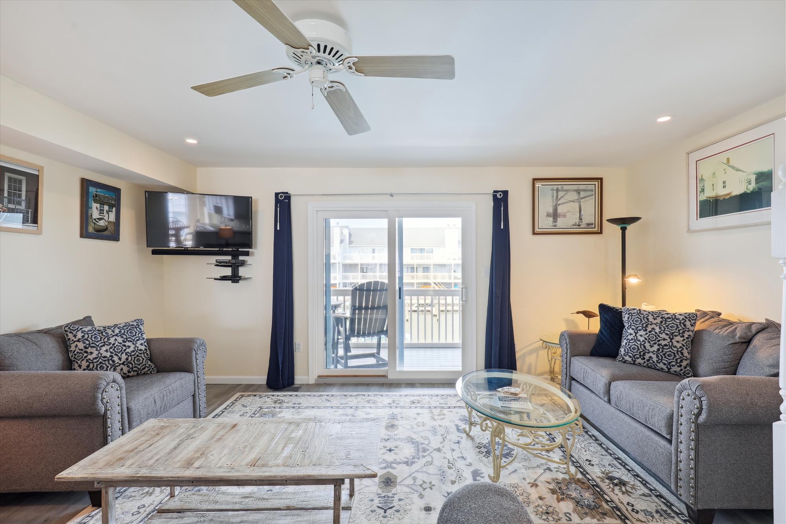 Settle into plush seating and enjoy your favorite shows on the wall-mounted TV, while the ceiling fan keeps you comfortable. Step out to the balcony for a breath of fresh air.