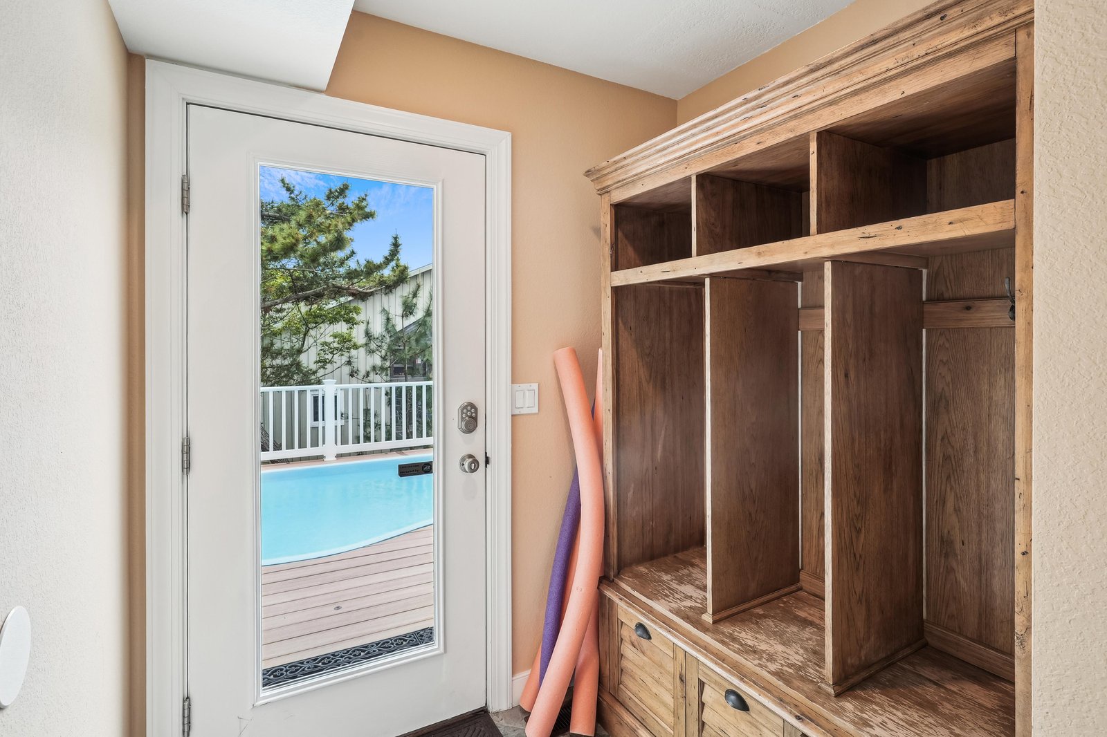 Store your beach gear and essentials in these rustic built-in cubbies, ready to help you make the most of your pool days.