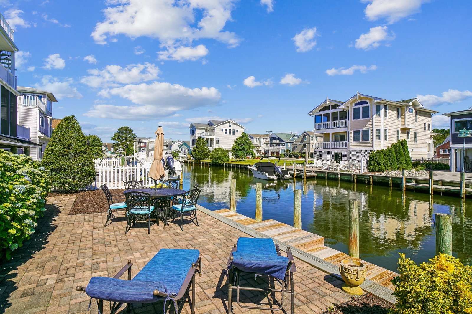 Relax by your private dock with waterfront lounging, dining, and serene canal views—perfect for peaceful mornings and sunset evenings at your coastal retreat.