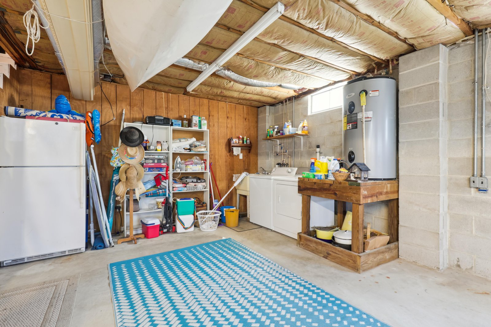 This functional utility space provides convenient access to laundry facilities and storage areas, helping you settle in and stay organized throughout your visit.