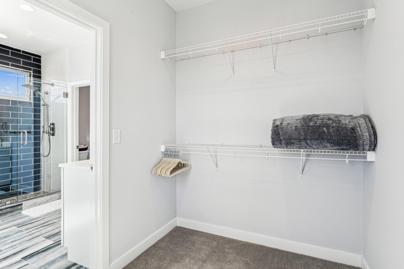 Unpack and settle in with ease in your spacious walk-in closet, complete with built-in shelving and plenty of hanging space for all your vacation wardrobe.