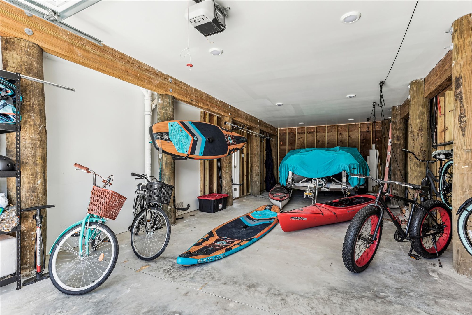 Your adventure awaits in this well-equipped sports garage, stocked with bikes, kayaks, and paddleboards for endless outdoor fun.