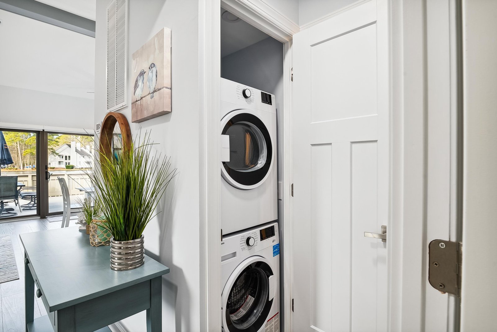 You'll appreciate the convenience of in-unit laundry with stacked washer and dryer tucked into a private closet—keeping essentials organized while you enjoy your stay.