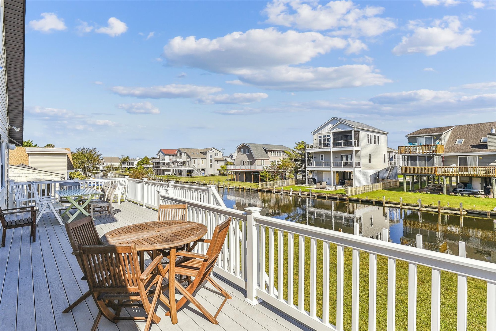 This waterfront deck offers peaceful canal views and outdoor dining space, perfect for morning coffee or evening meals by the water.