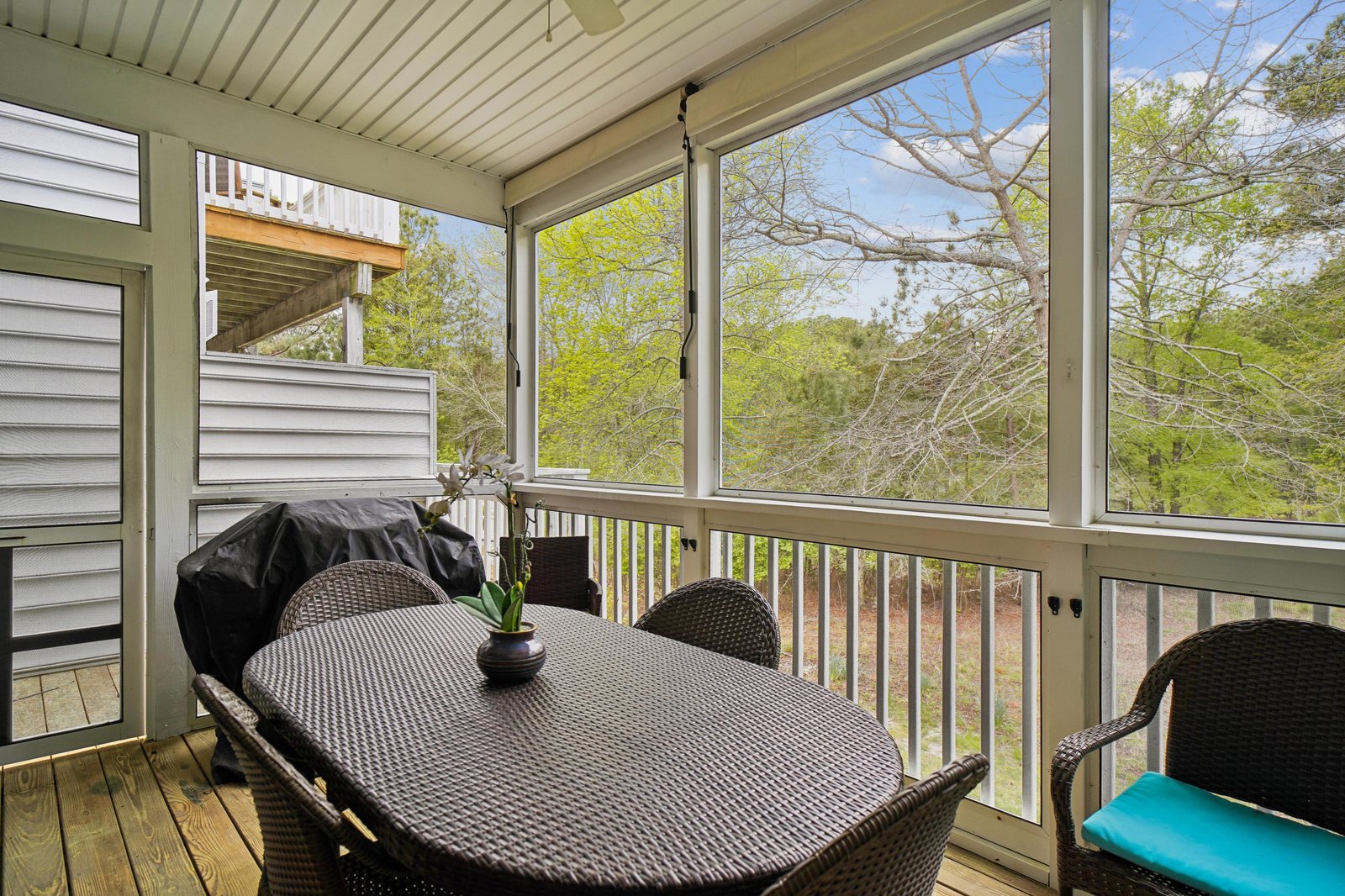 Relax in your screened-in porch with peaceful treetop views. Enjoy morning coffee or evening meals surrounded by nature's quiet beauty and fresh air.