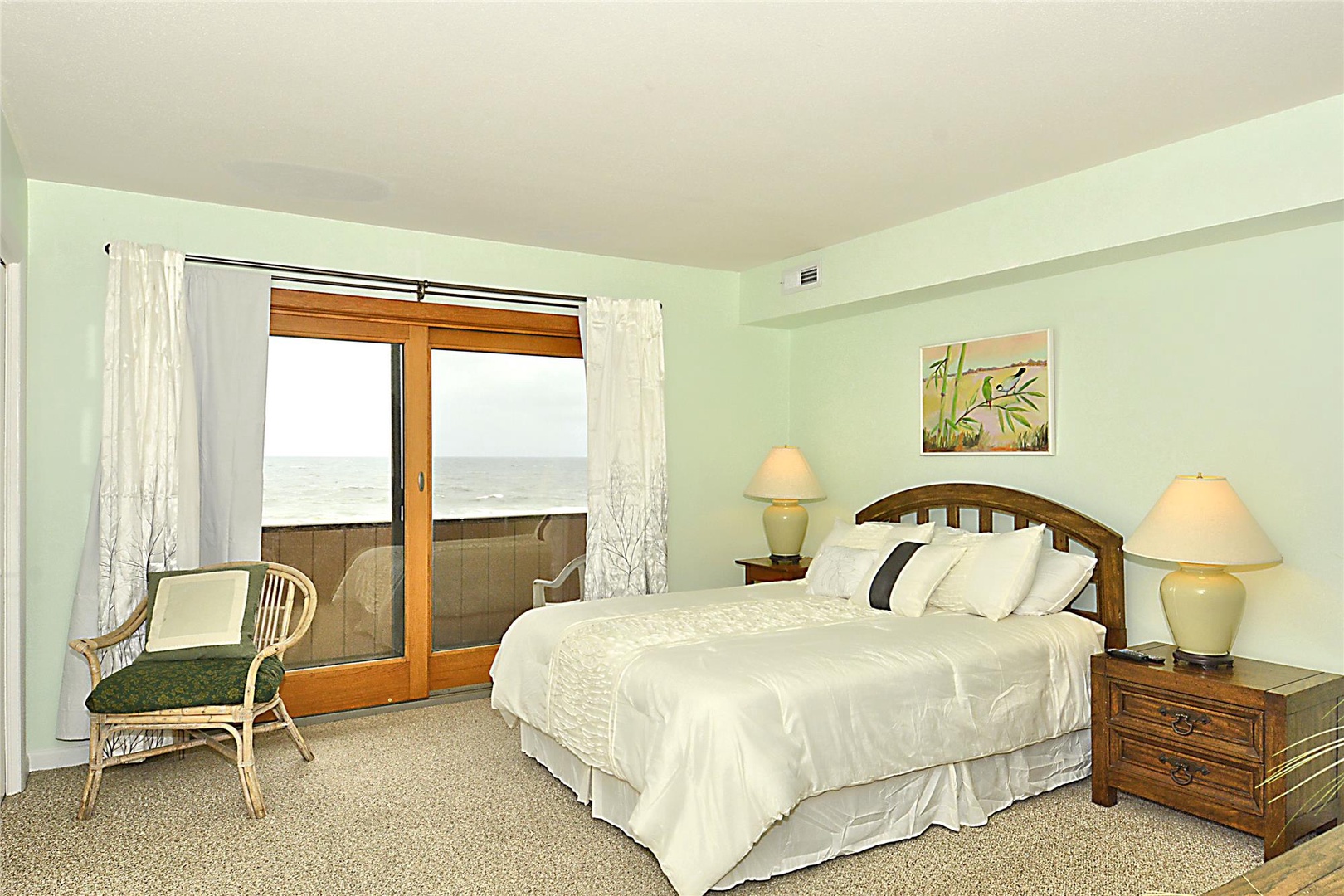 Wake up to ocean views from your comfortable bed, with sliding doors opening to your private balcony overlooking the sea.