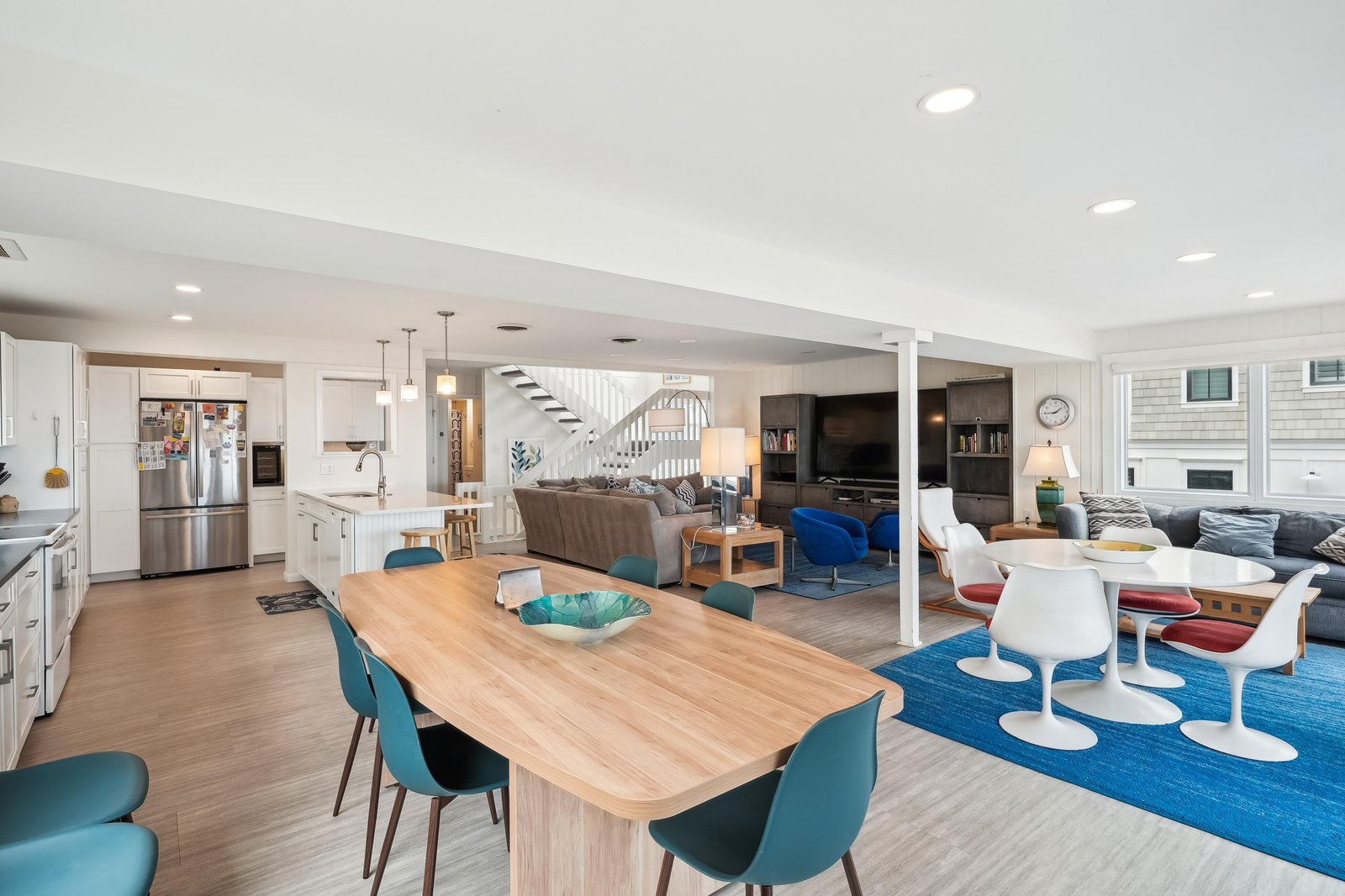 Step into your bright, open-concept retreat where modern comfort meets coastal style. Gather around the sleek dining table or sink into plush seating while natural light fills every corner—your perfect home base for unforgettable getaways.