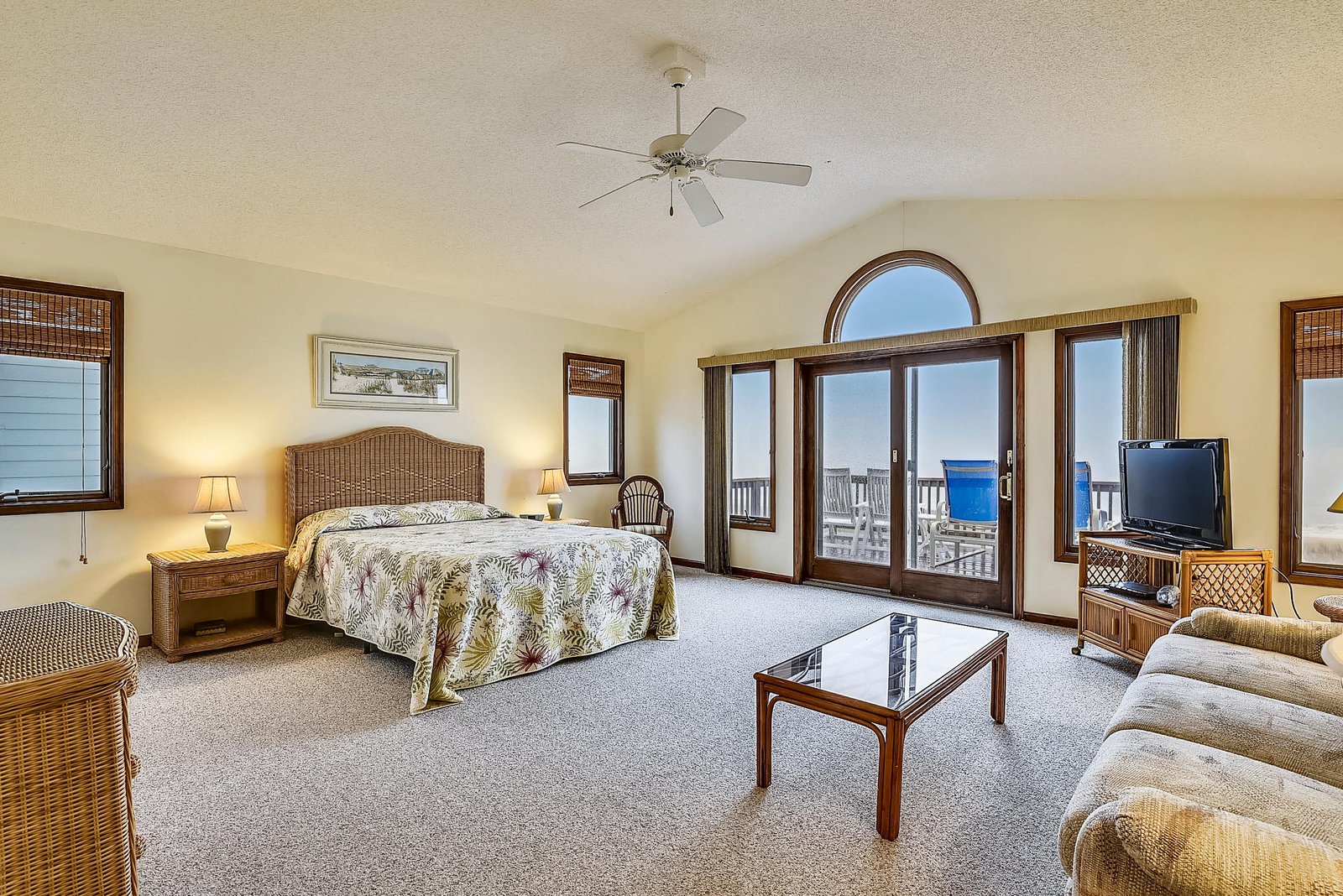 Wake up to stunning ocean views through your private balcony doors, where the sea stretches endlessly before you in this light-filled retreat.