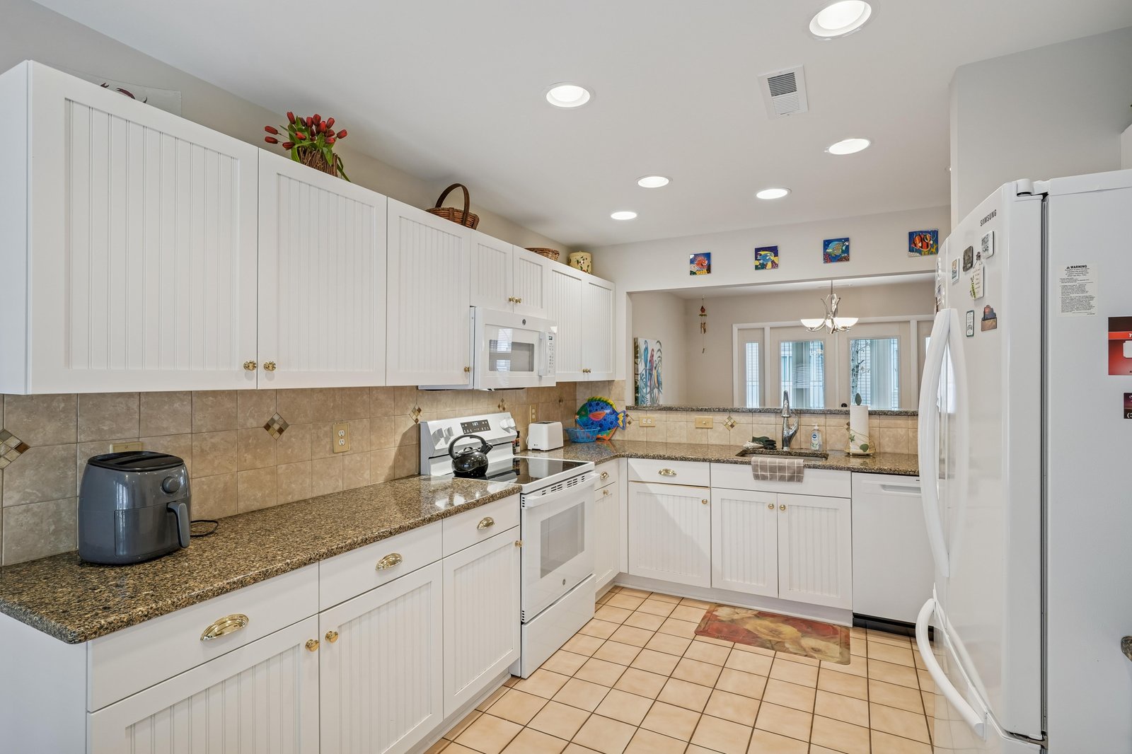 Your vacation kitchen awaits, fully equipped with modern appliances, spacious counters, and everything you need to whip up favorite meals together.