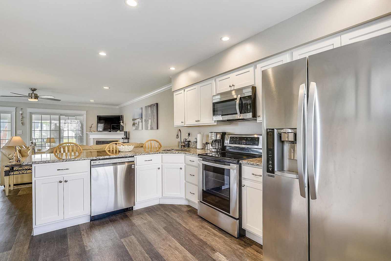 Your fully equipped kitchen features modern stainless steel appliances, granite countertops, and all the essentials for preparing delicious meals during your stay.