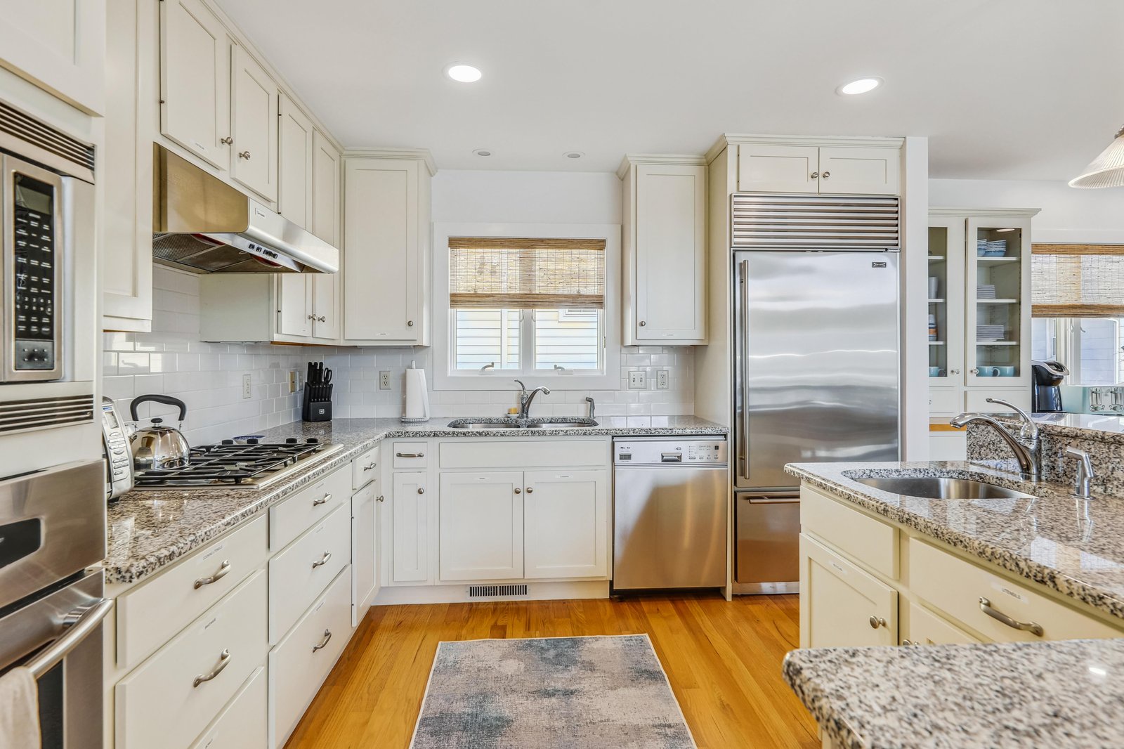 Your culinary haven awaits with gleaming stainless steel appliances, granite countertops, and ample cabinet space ready for your favorite recipes and gatherings.