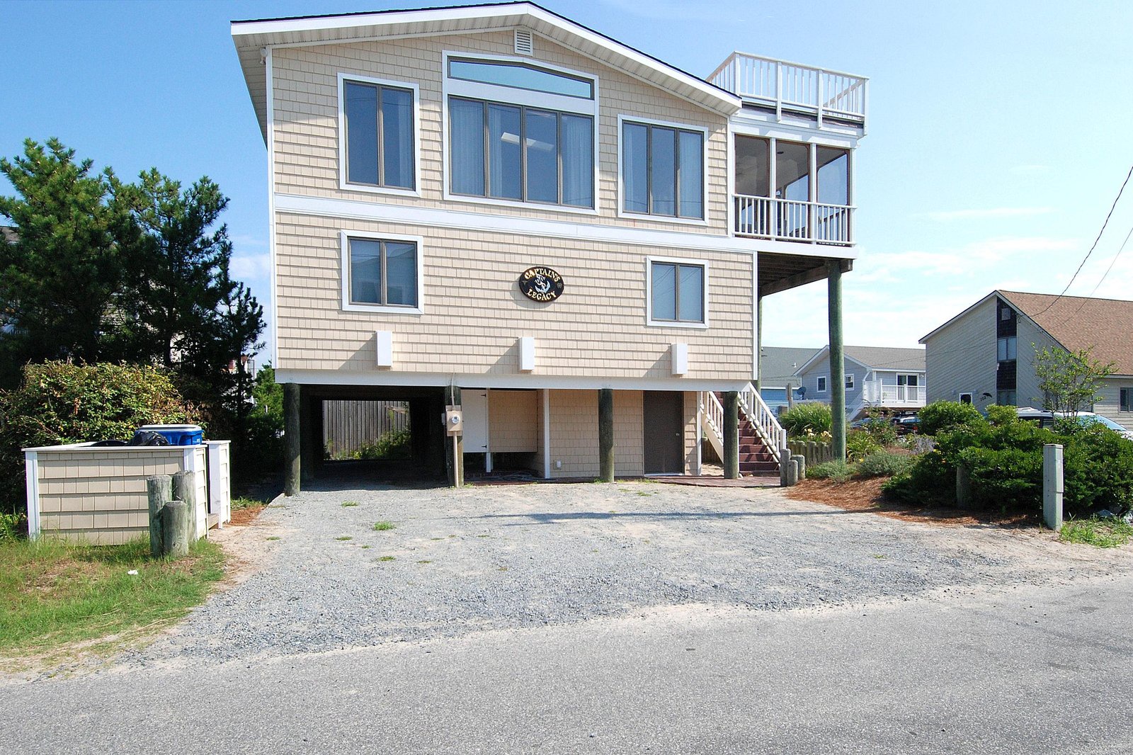 A spacious coastal home with elevated design and covered parking, set in a peaceful neighborhood with nearby beach access.