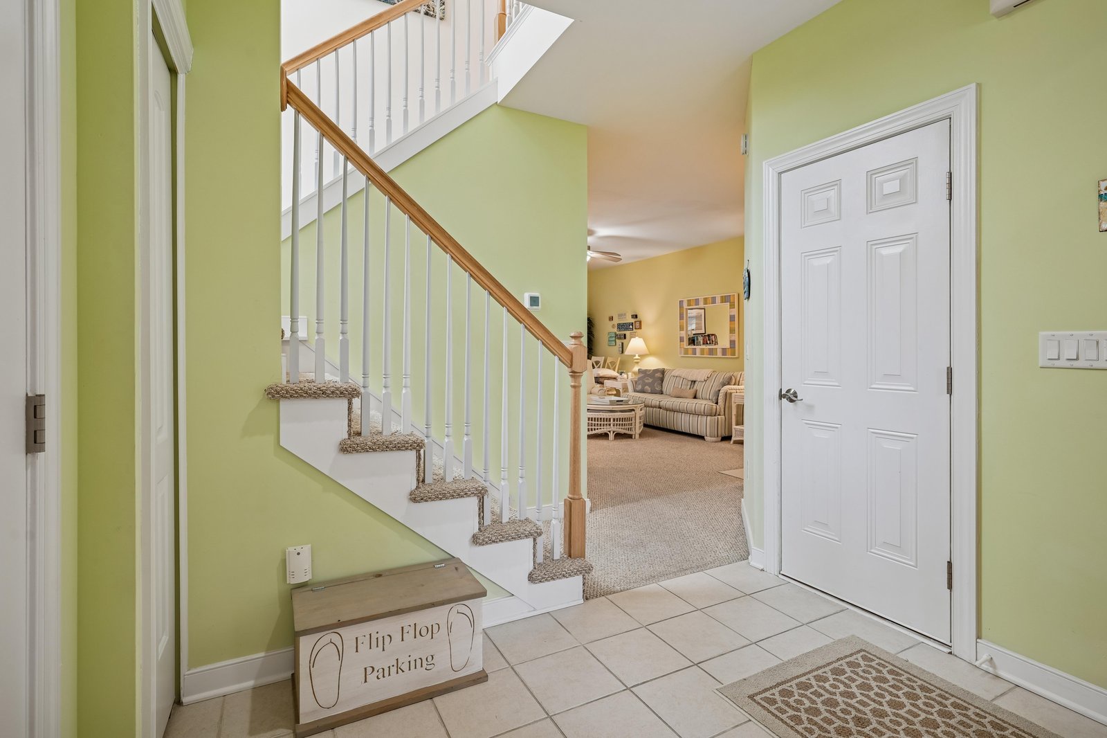 Step inside to find a bright, welcoming entryway with cheerful walls and airy skylights guiding you upstairs to your home away from home.