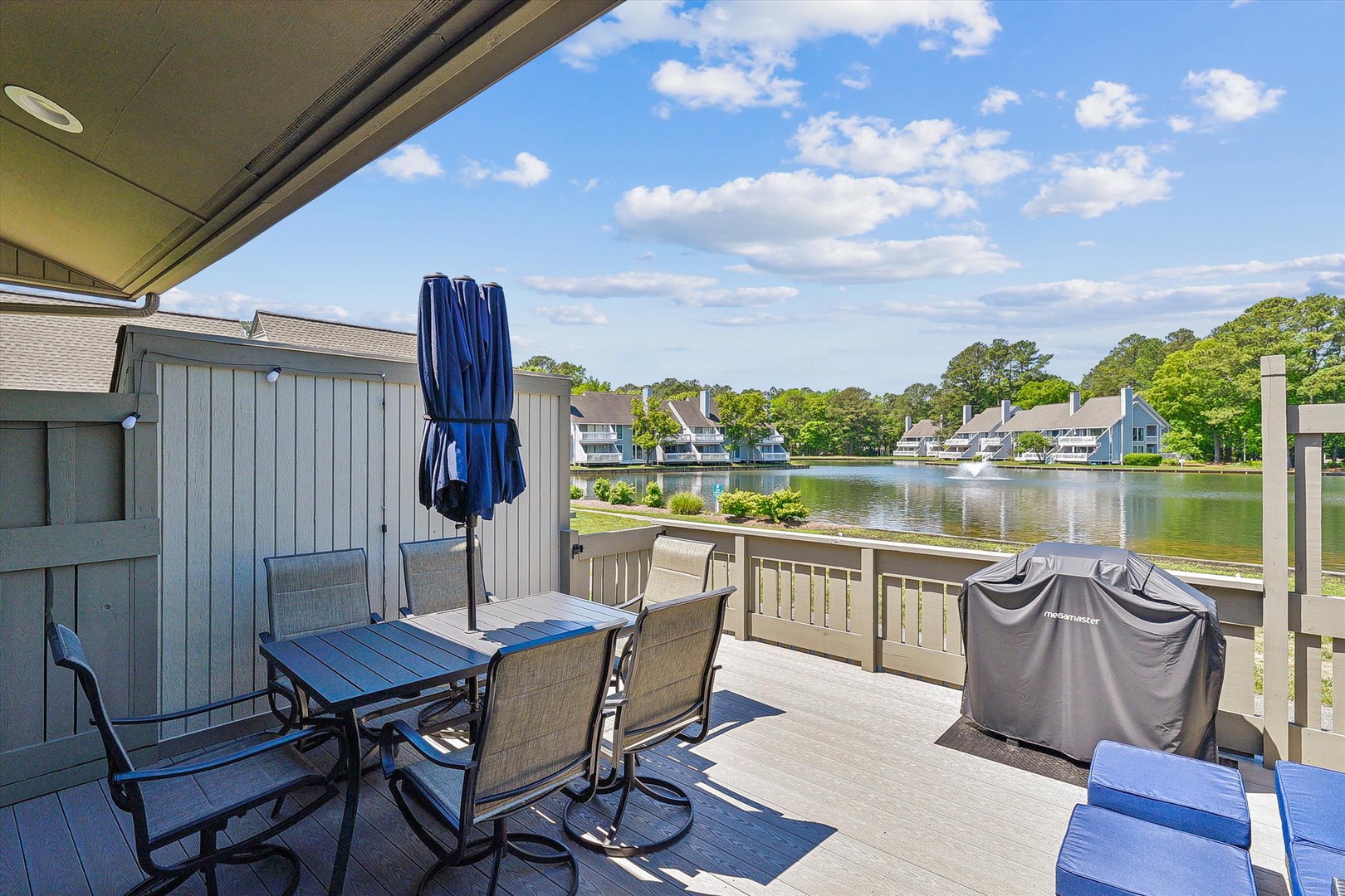 Step onto your private deck and take in tranquil lake views framed by lush greenery. Gather around the outdoor dining table or fire up the grill for a meal in the fresh air.