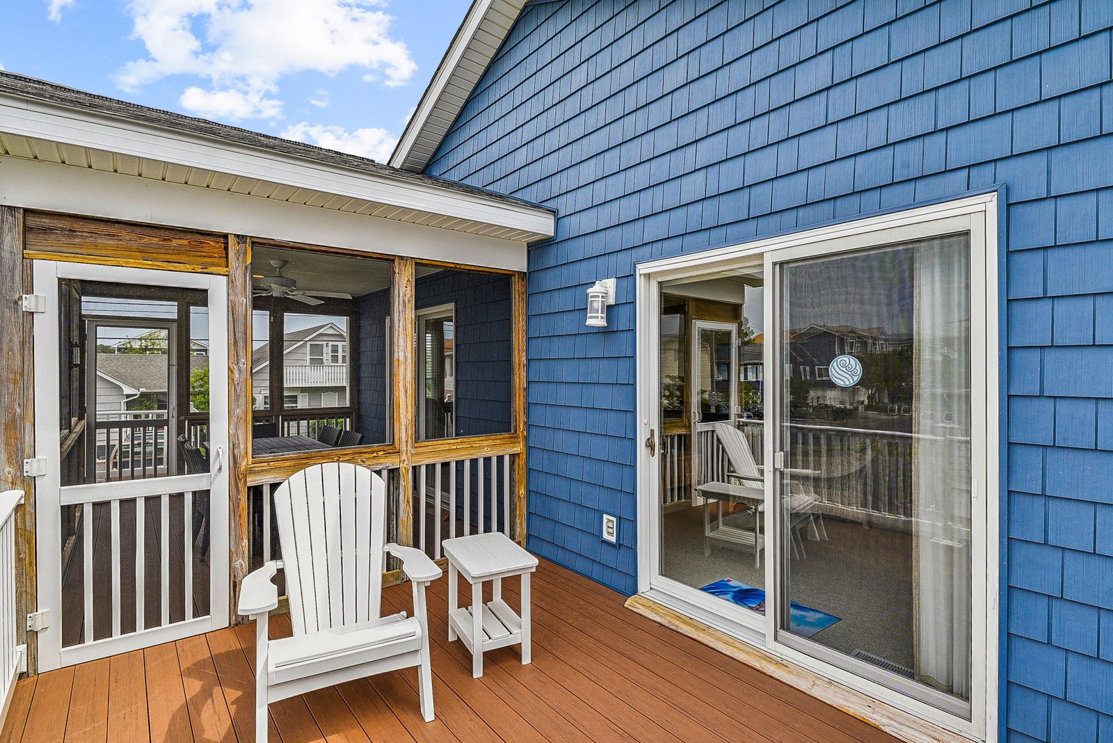 Step outside to your private covered deck where you can relax in cozy Adirondack chairs, enjoy morning coffee, or unwind after exploring the area—all in a peaceful outdoor setting.
