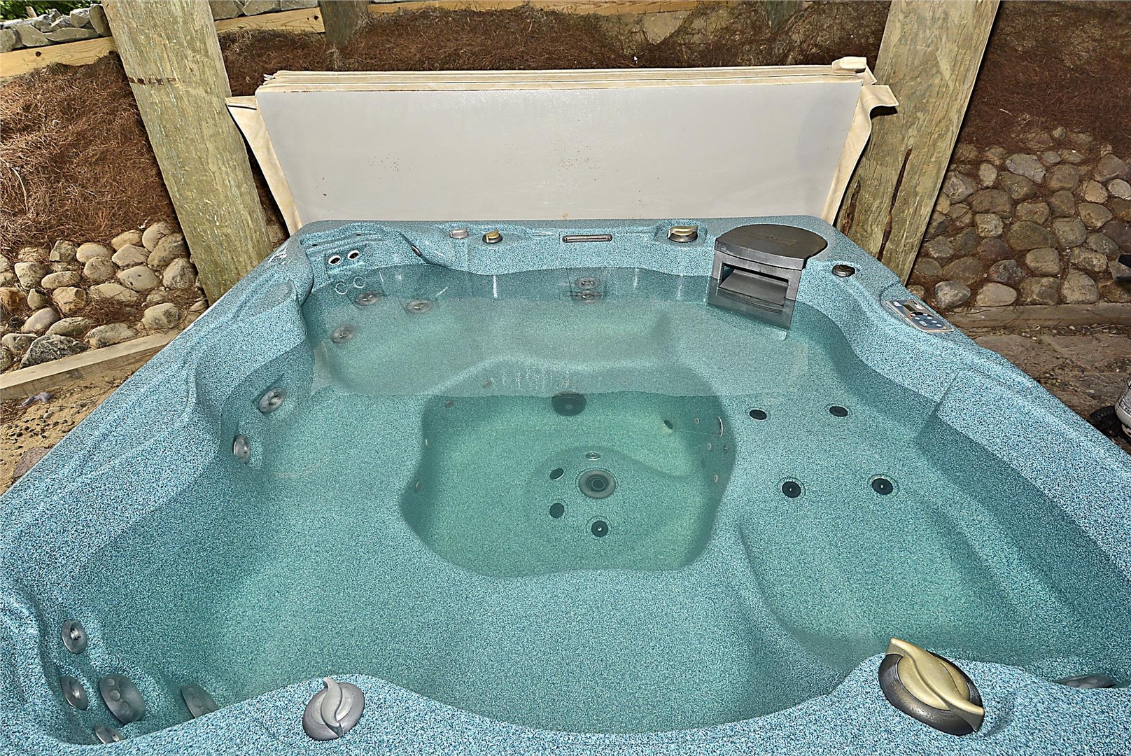 Unwind in your private hot tub with therapeutic jets, perfect for soaking under the stars after a day of adventure.