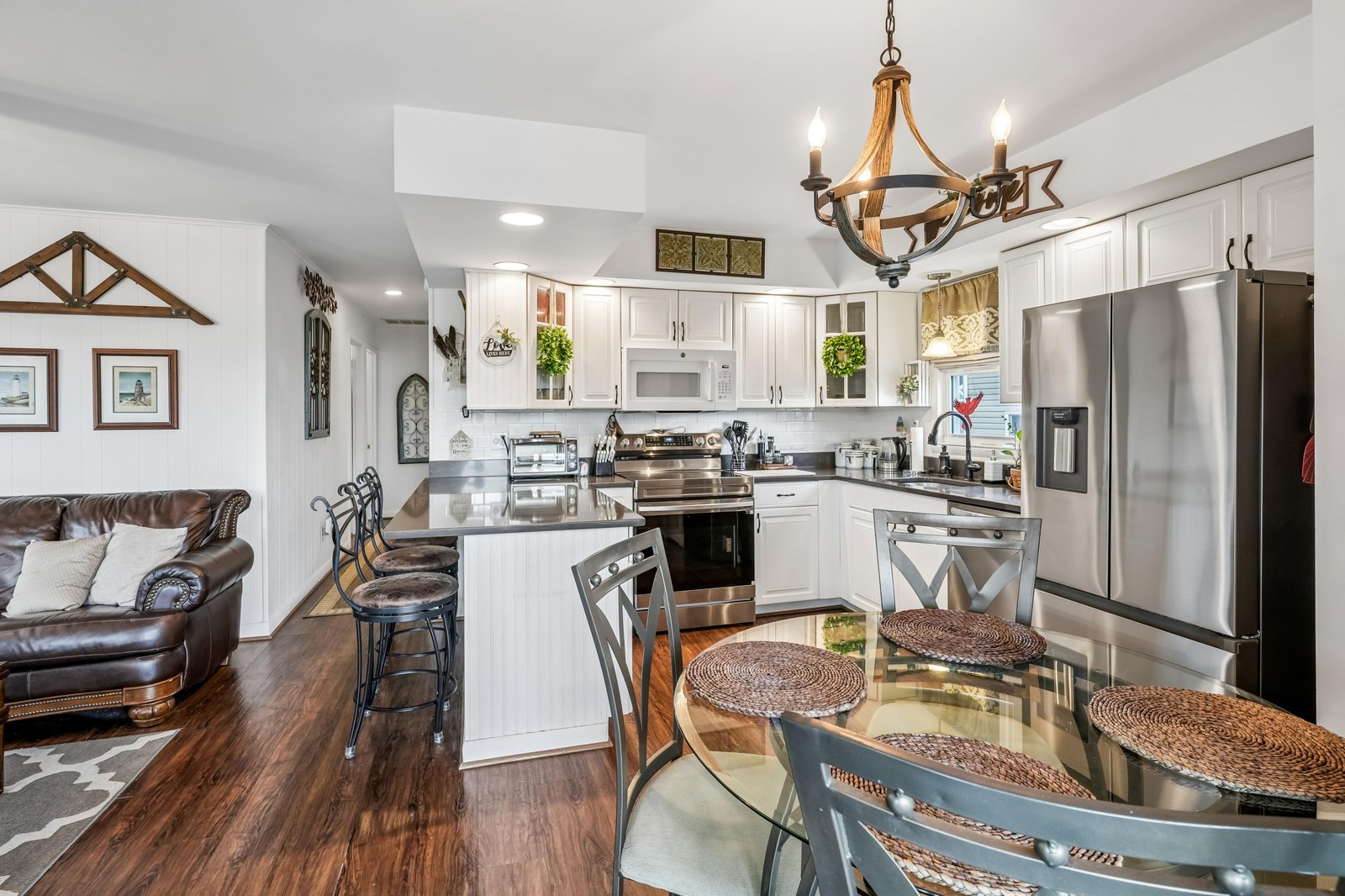 Gather, cook, and relax in your open-concept space with a fully equipped kitchen, cozy leather seating, and a welcoming dining area perfect for making vacation memories.