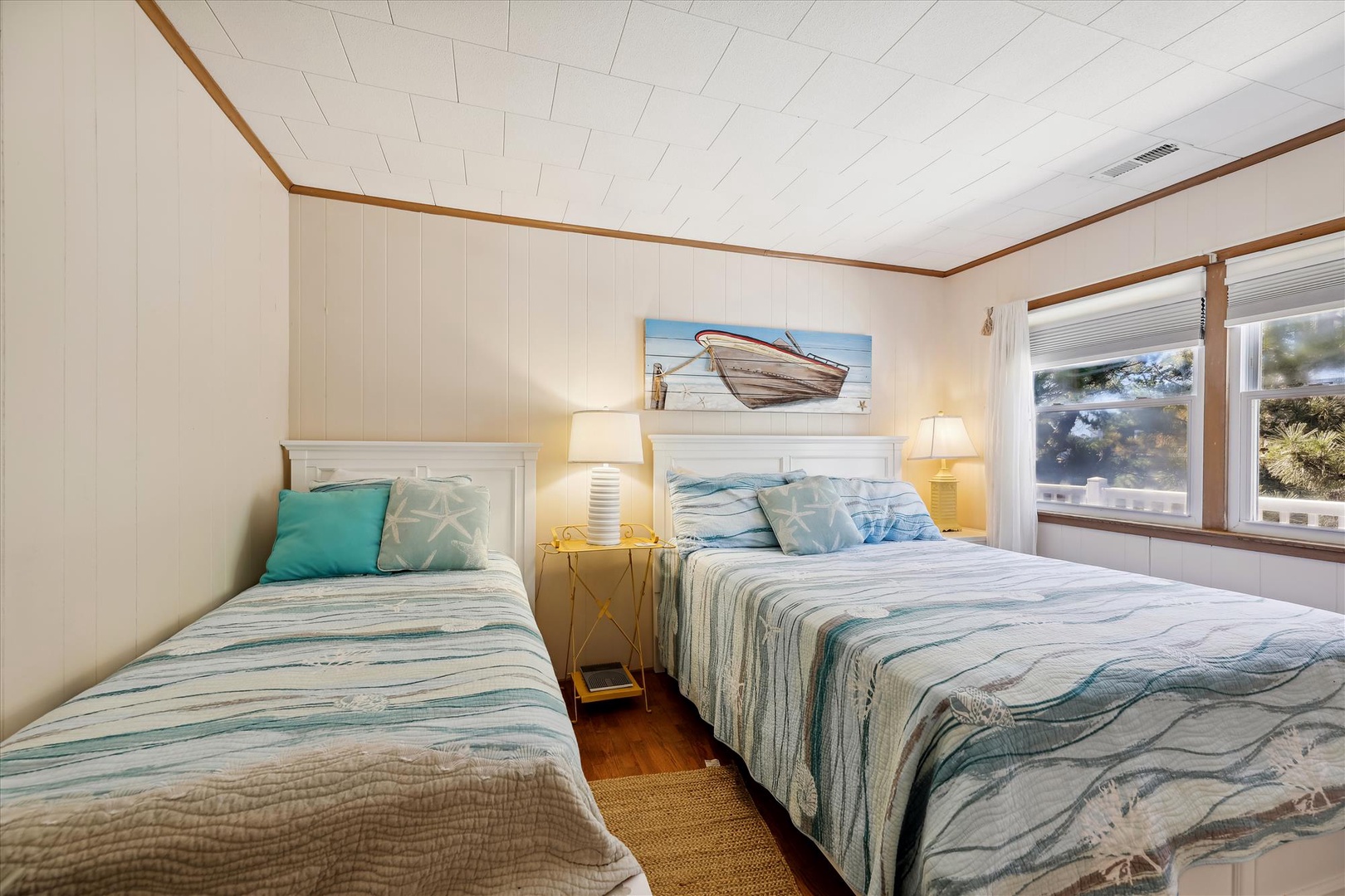 Unwind in your coastal bedroom with soft ocean-inspired linens, gentle natural light, and calming seaside artwork. Perfect for a restful night's sleep after a day of adventure.