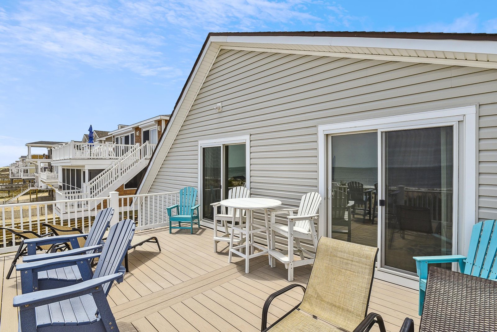 Step out onto your private deck and settle into comfortable beach-style seating—perfect for morning coffee or sunset cocktails with an ocean breeze.