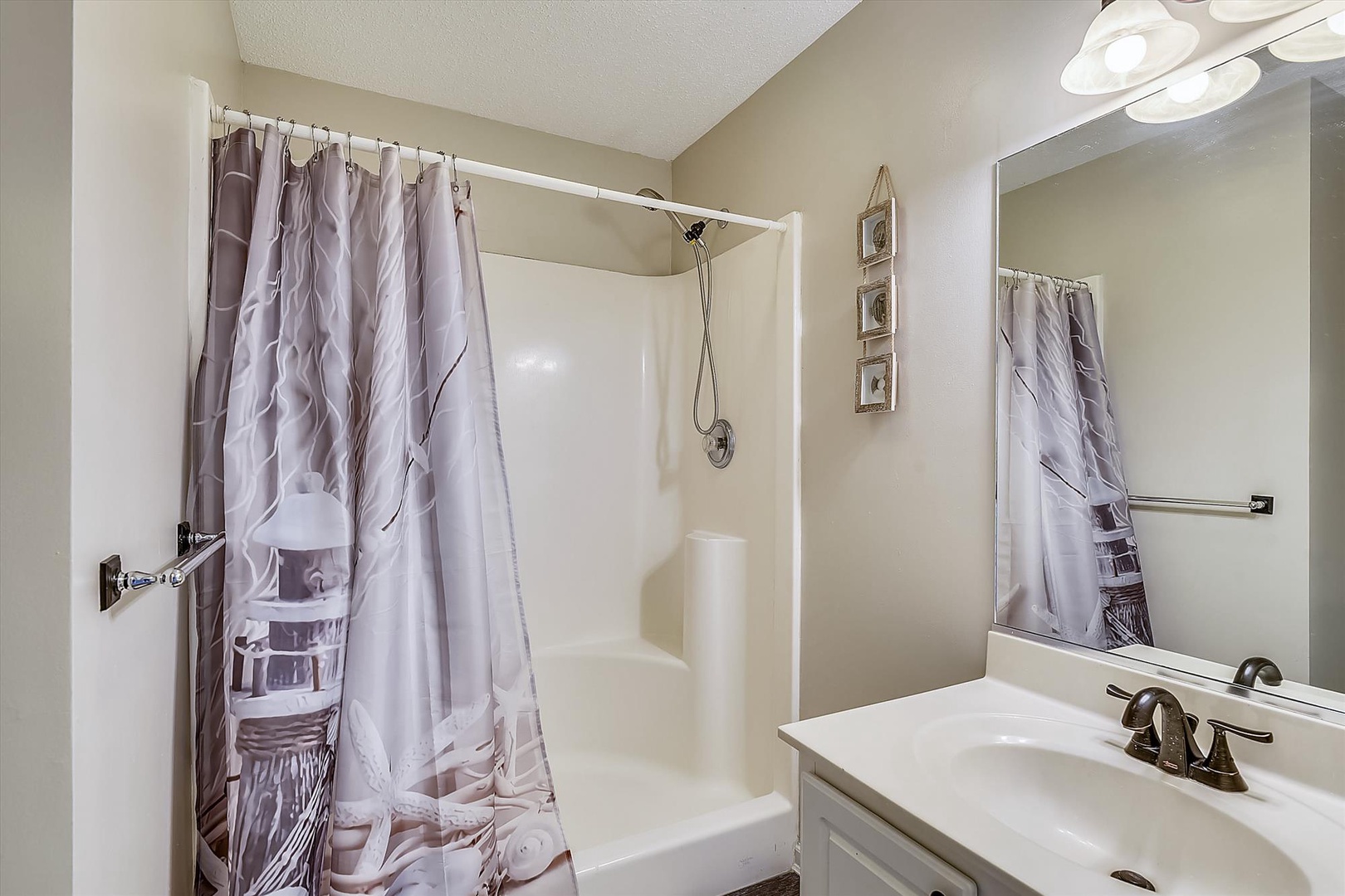 Step into your private bathroom with fresh towels, a spacious shower, and everything you need to feel refreshed and right at home after a day of adventure.