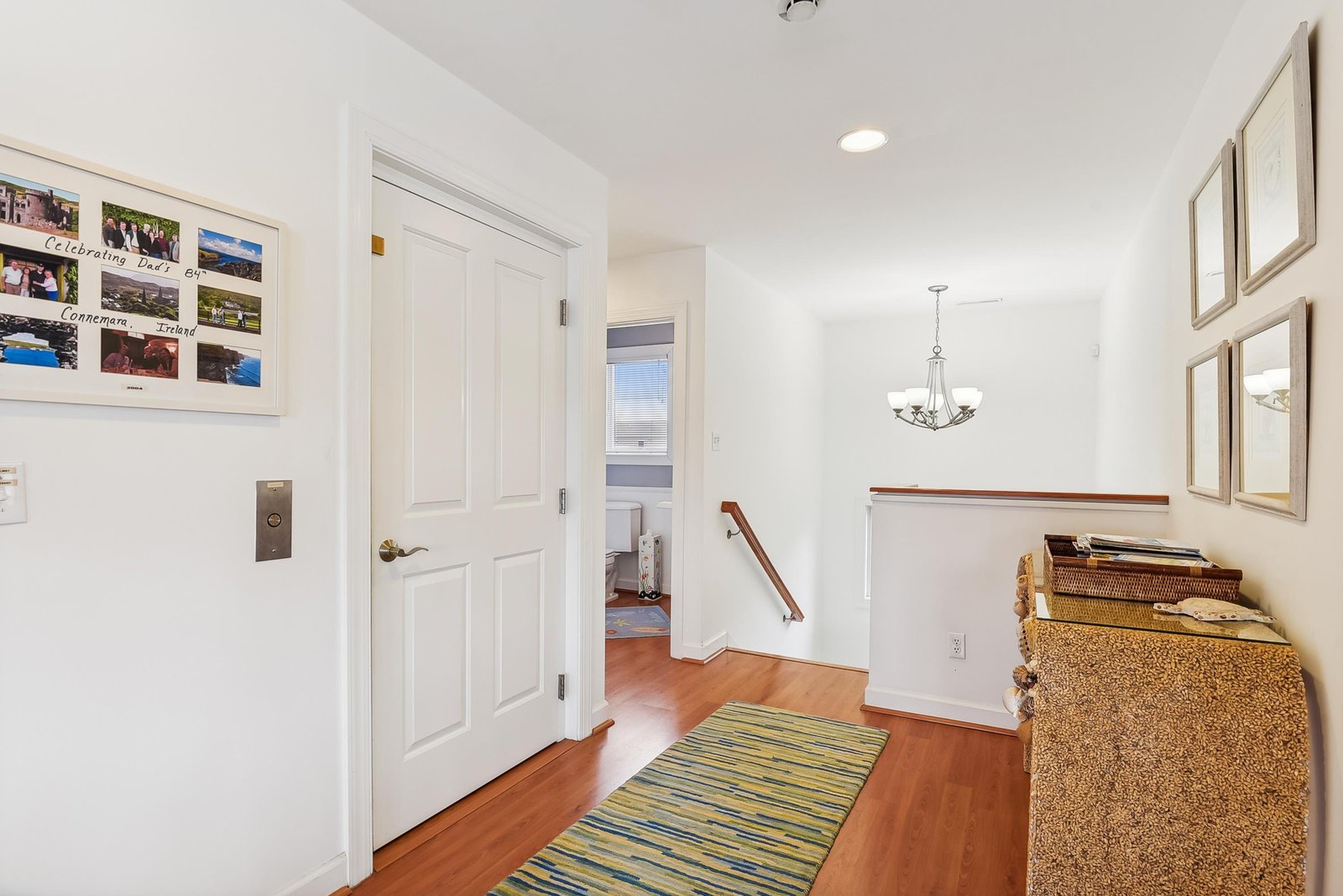 Step into your bright, welcoming entry where warm wood floors and cheerful decor set the tone for a relaxing getaway.