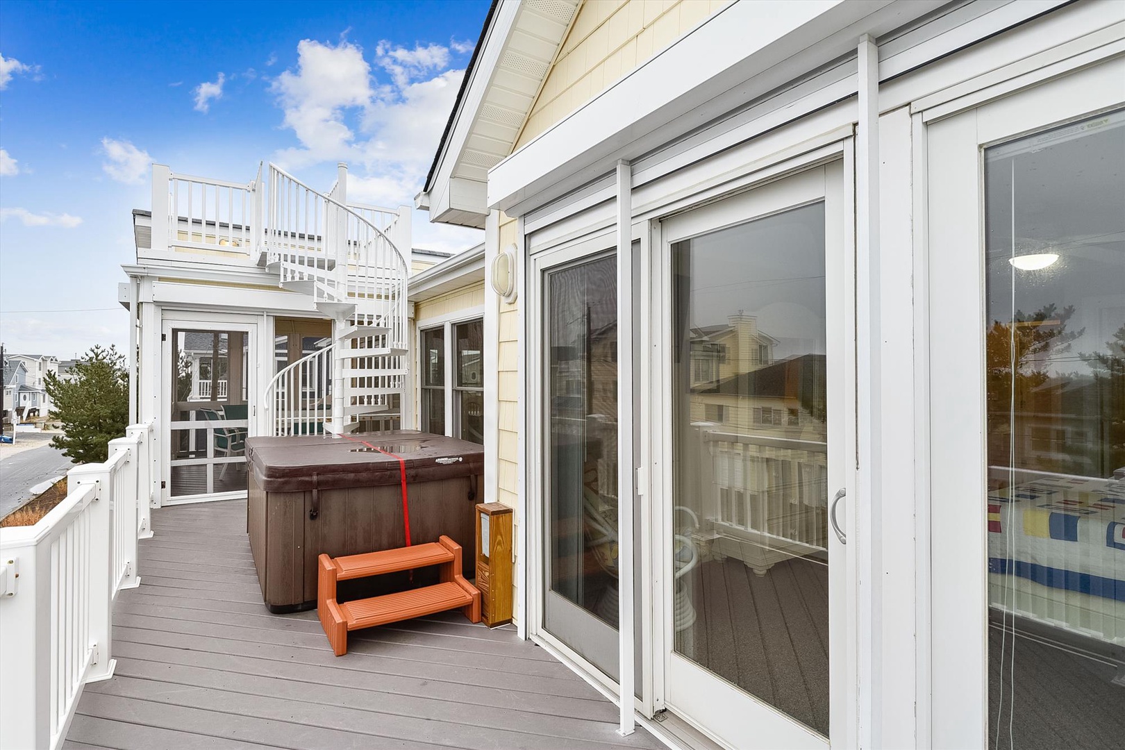 Step out onto your private deck, where a hot tub awaits beneath the open sky. Unwind after a day exploring the coast, soaking in the warm bubbles while enjoying the peaceful surroundings.