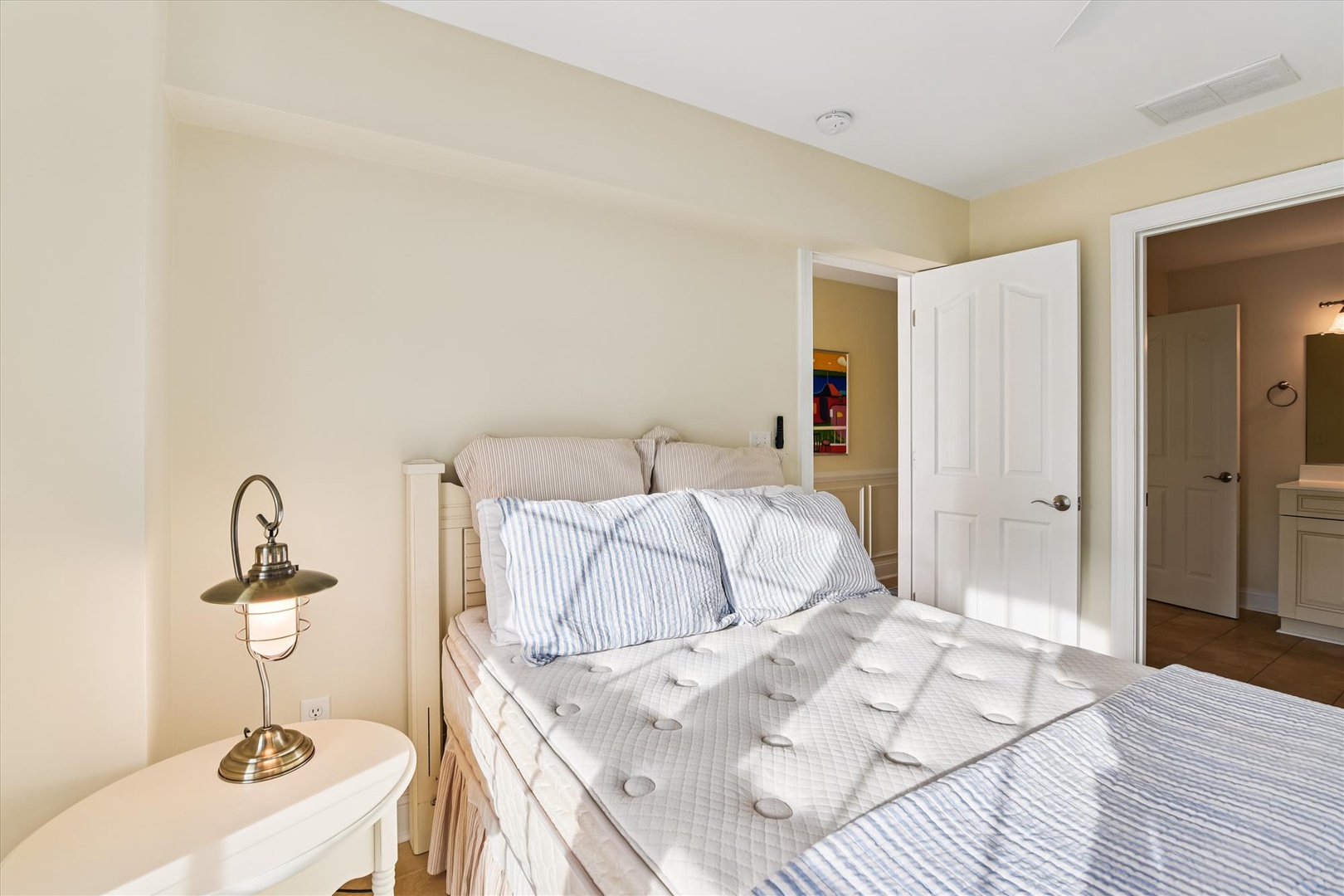 Unwind in your cozy bedroom, where soft linens and gentle natural light create the perfect retreat for restful nights and peaceful mornings during your stay.