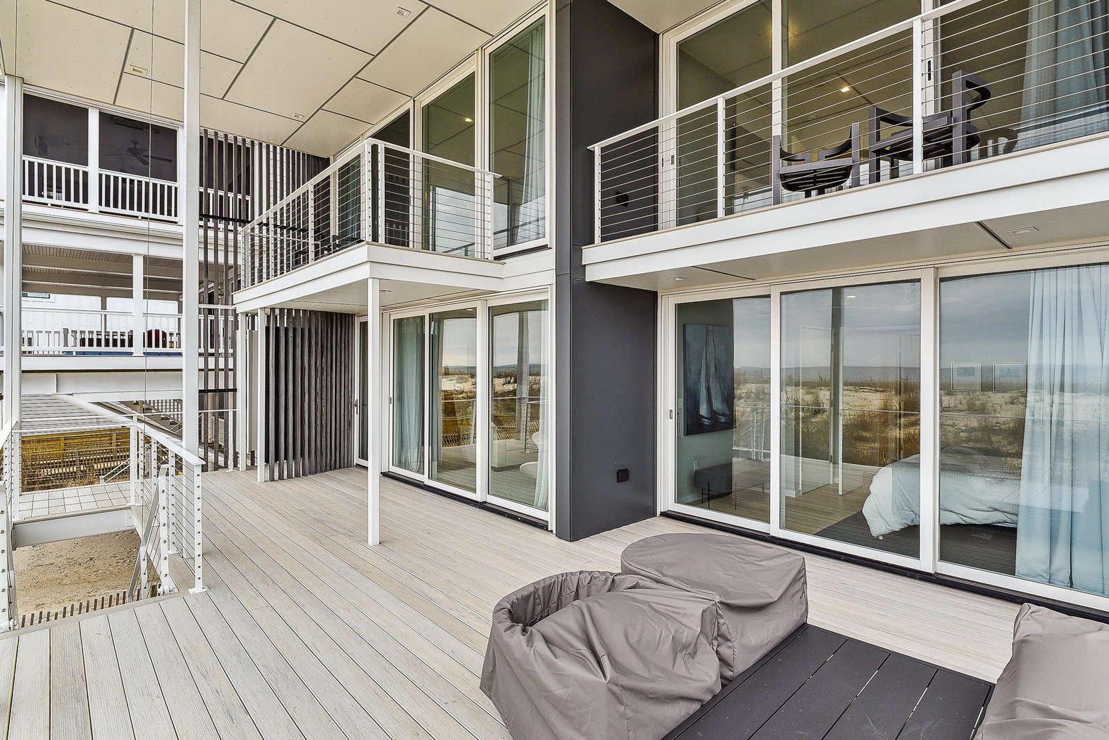 Your private deck welcomes you with sweeping beach and dune views—ideal for morning coffee or unwinding after a day exploring the coast.