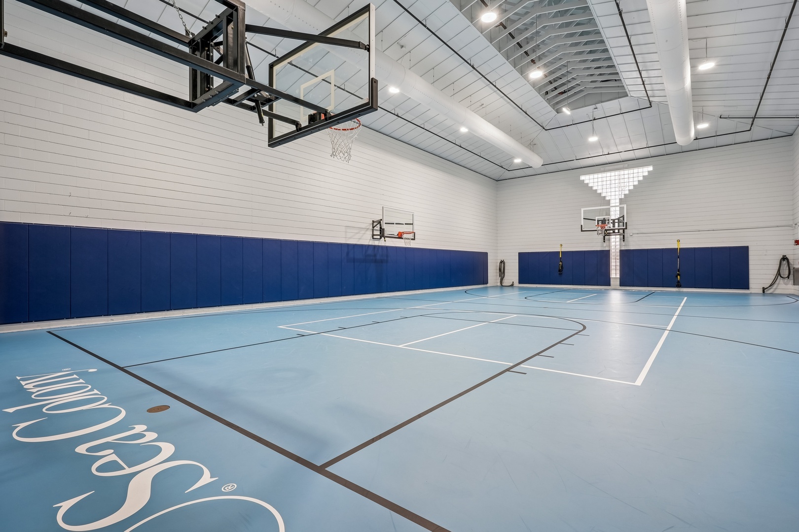 Challenge friends to a friendly game on your private full-sized basketball court, complete with professional hoops and gleaming hardwood floors.