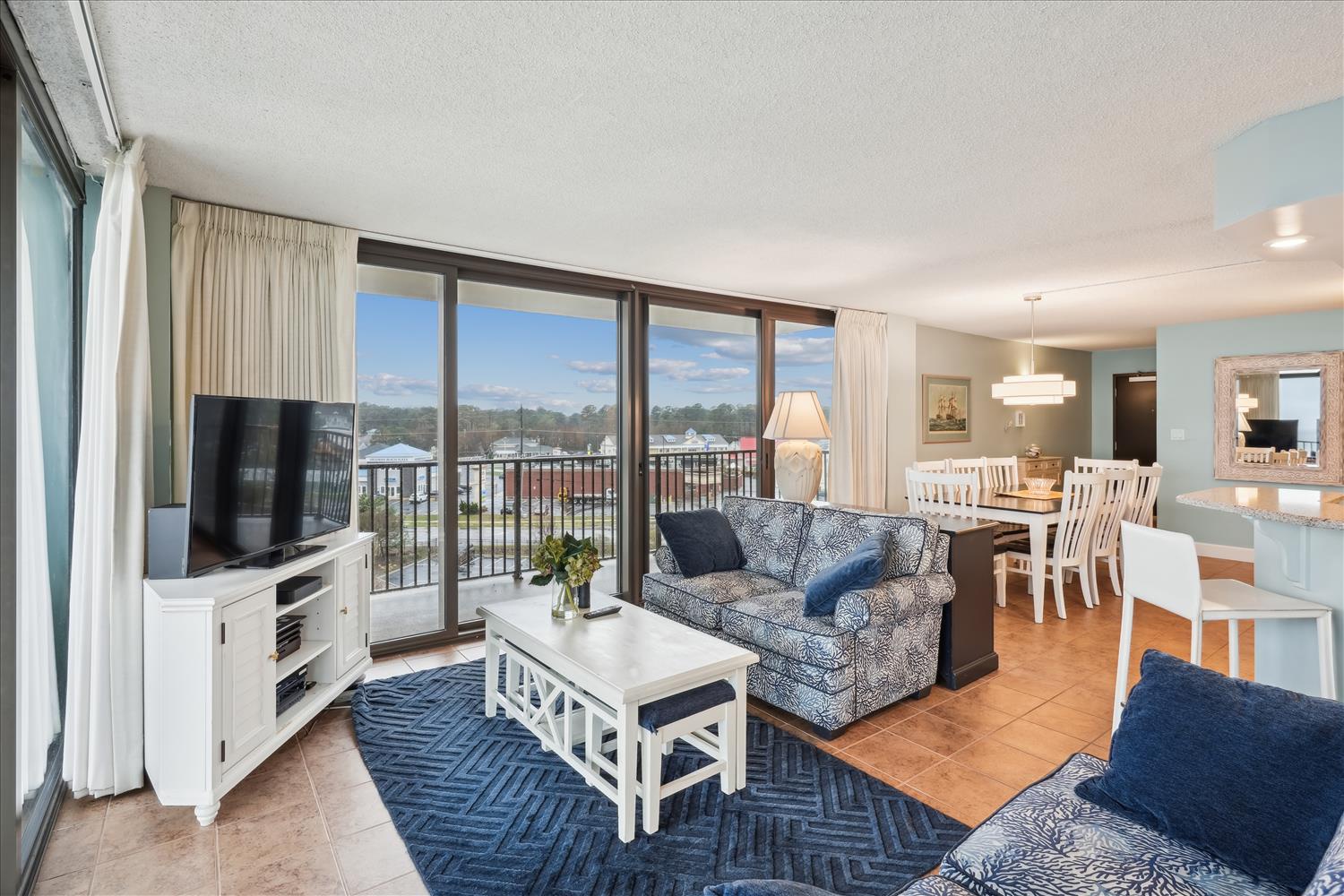 Step into your spacious retreat where coastal-inspired décor meets modern comfort. Relax in the open living area with bay views from your private balcony, perfect for morning coffee and evening breezes.