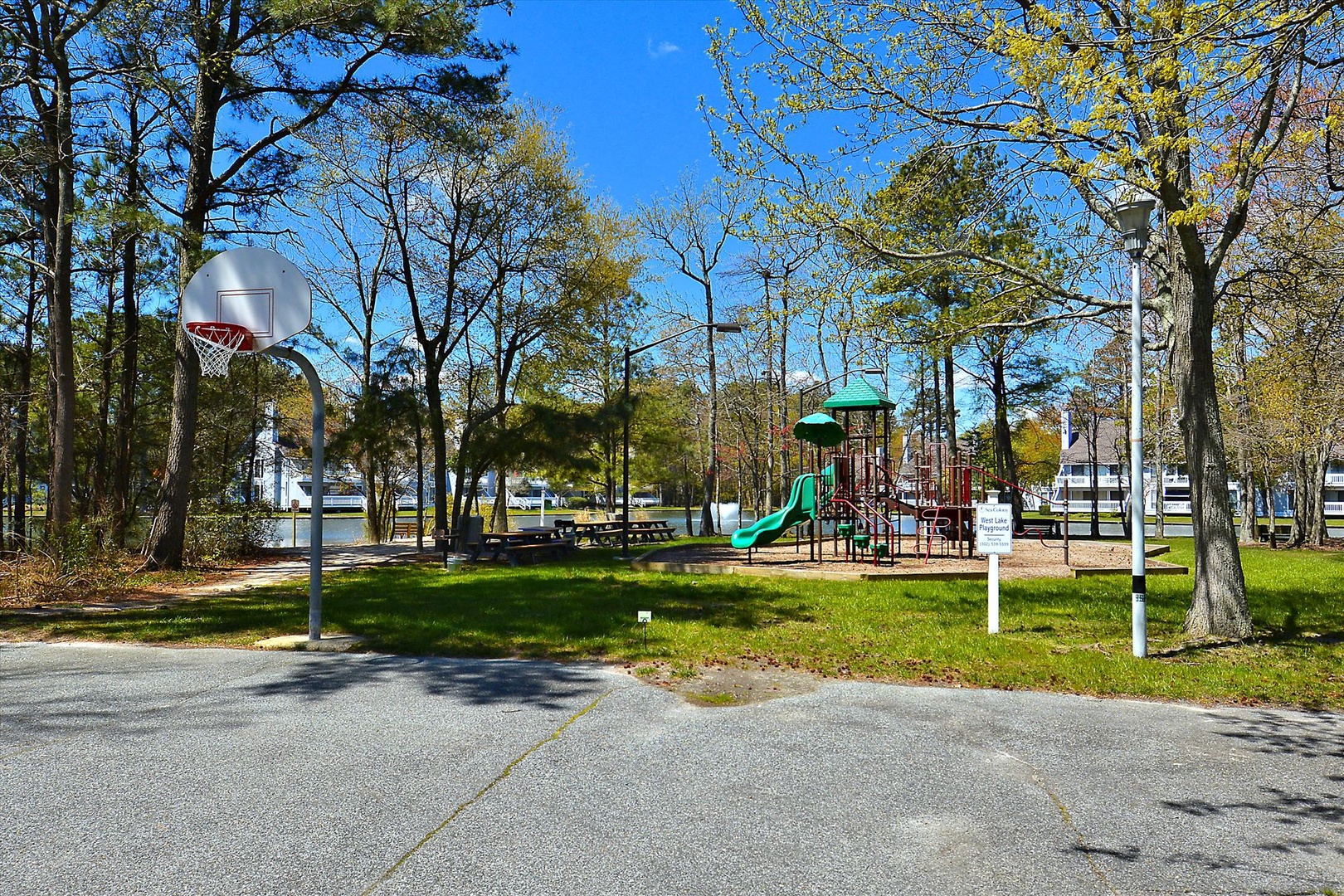 A nearby park features a playground, basketball court, picnic tables, and waterfront views—perfect for families seeking outdoor recreation during their stay.