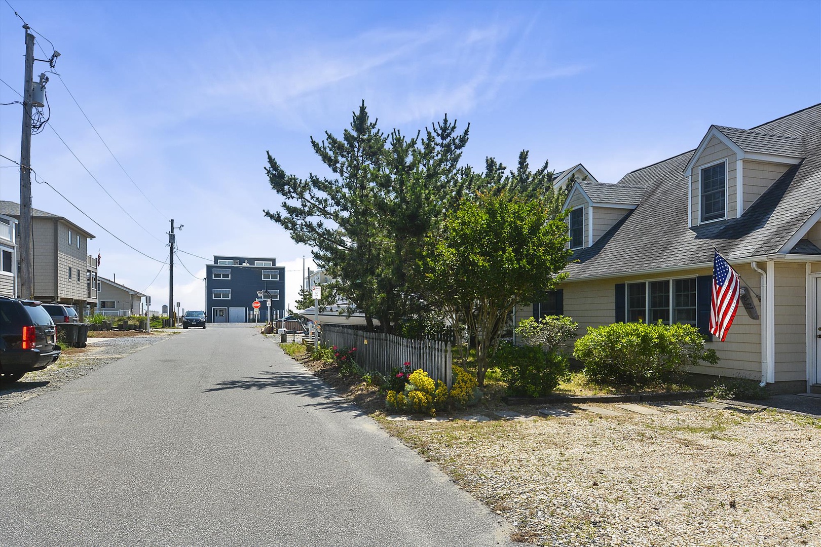 A peaceful coastal neighborhood features charming residential homes with well-maintained landscaping, offering easy access to nearby beaches and local attractions.