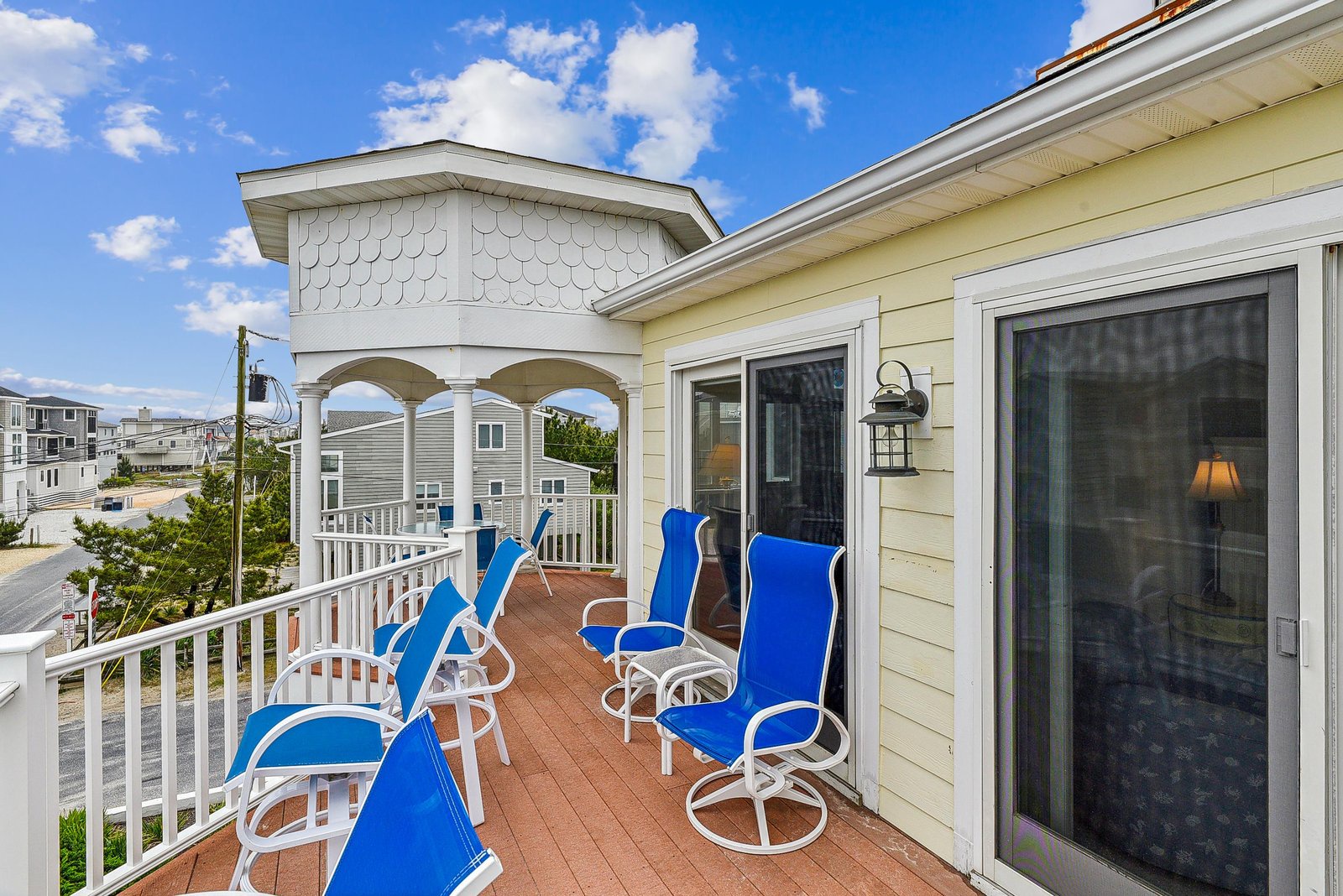 Settle into your private deck with comfy seating for everyone. Catch the ocean breeze, soak in the sunshine, and unwind in your own little beach retreat.